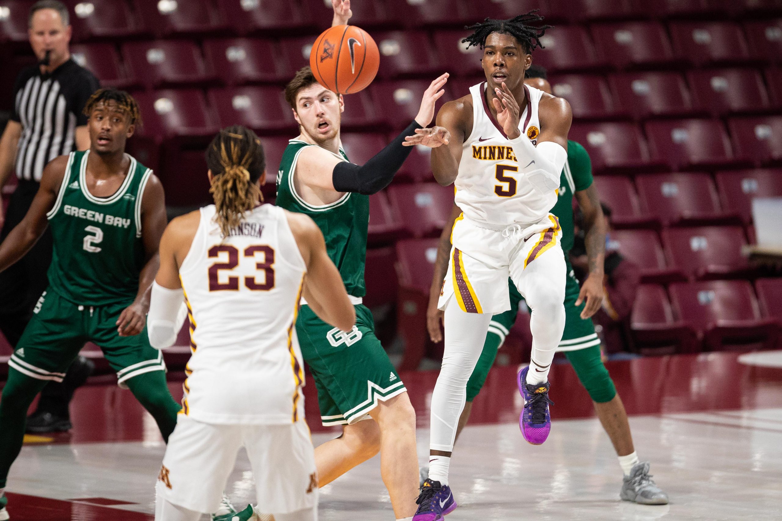Minnesota Golden Gophers guard Marcus Carr passes the ball during win over Green Bay