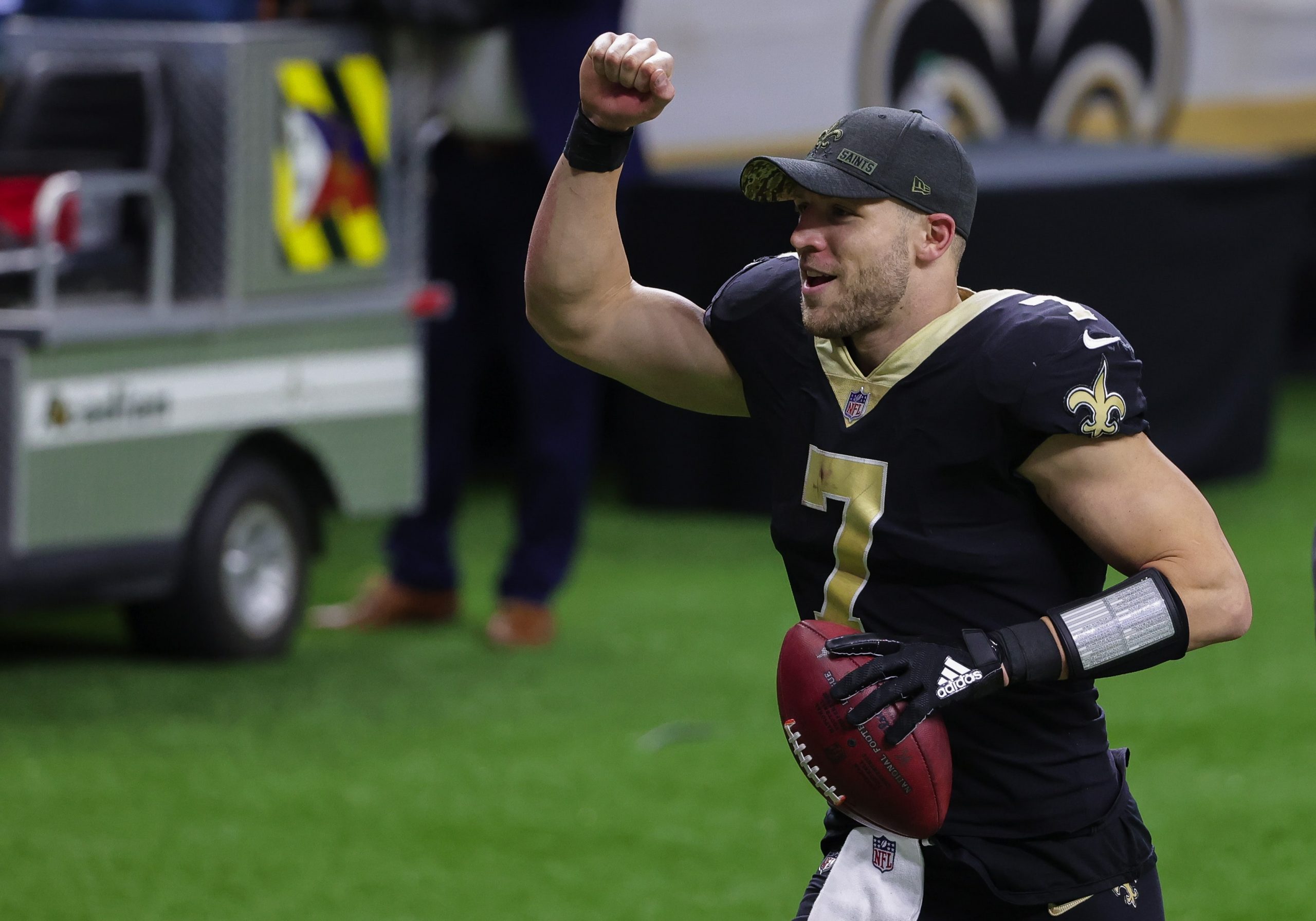 New Orleans Saints quarterback Taysom Hill jogs off the field after win over Falcons