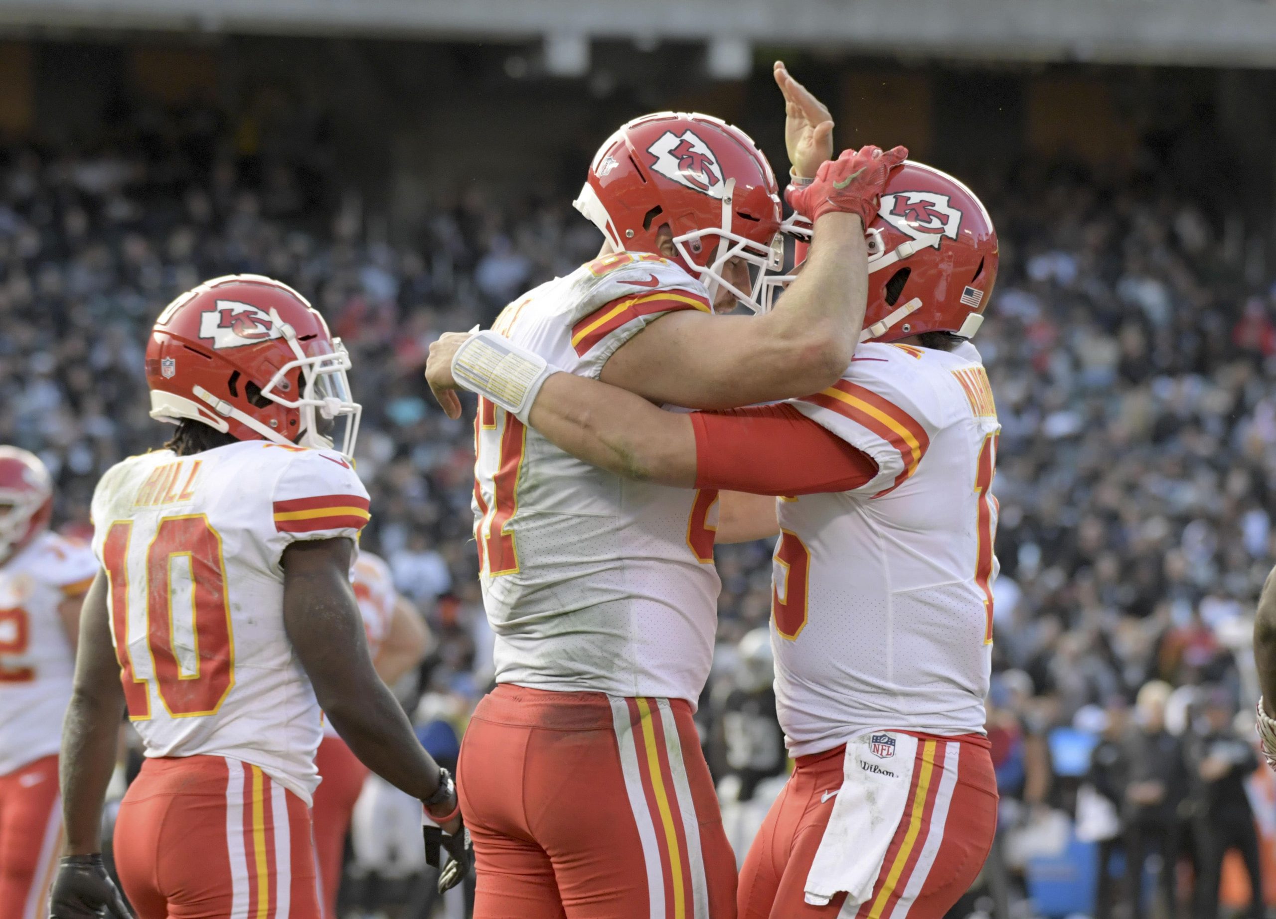 Patrick Mahomes, Travis Kelce, and Tyreek Hill of the Kansas City Chiefs AFC