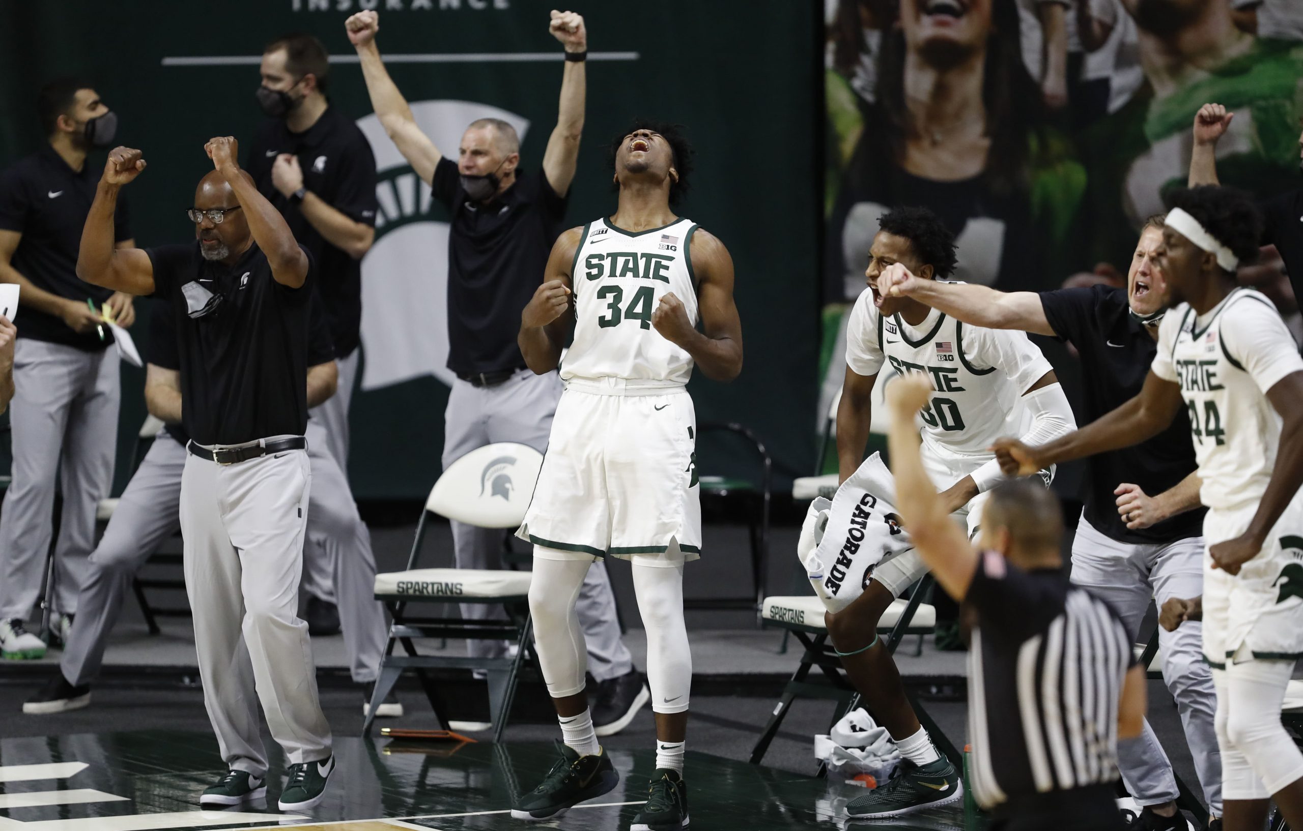 Michigan State Spartans forward Julius Marble II celebrates with teammates during win over Western Michigan