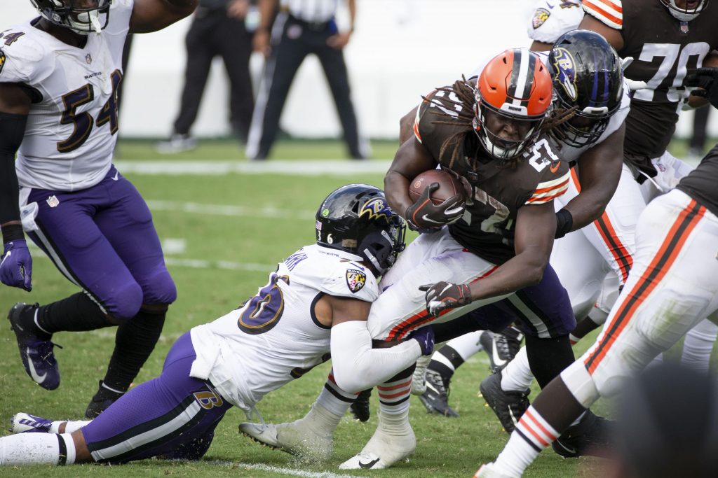 The Baltimore Ravens bring down Kareem Hunt of the Cleveland Browns