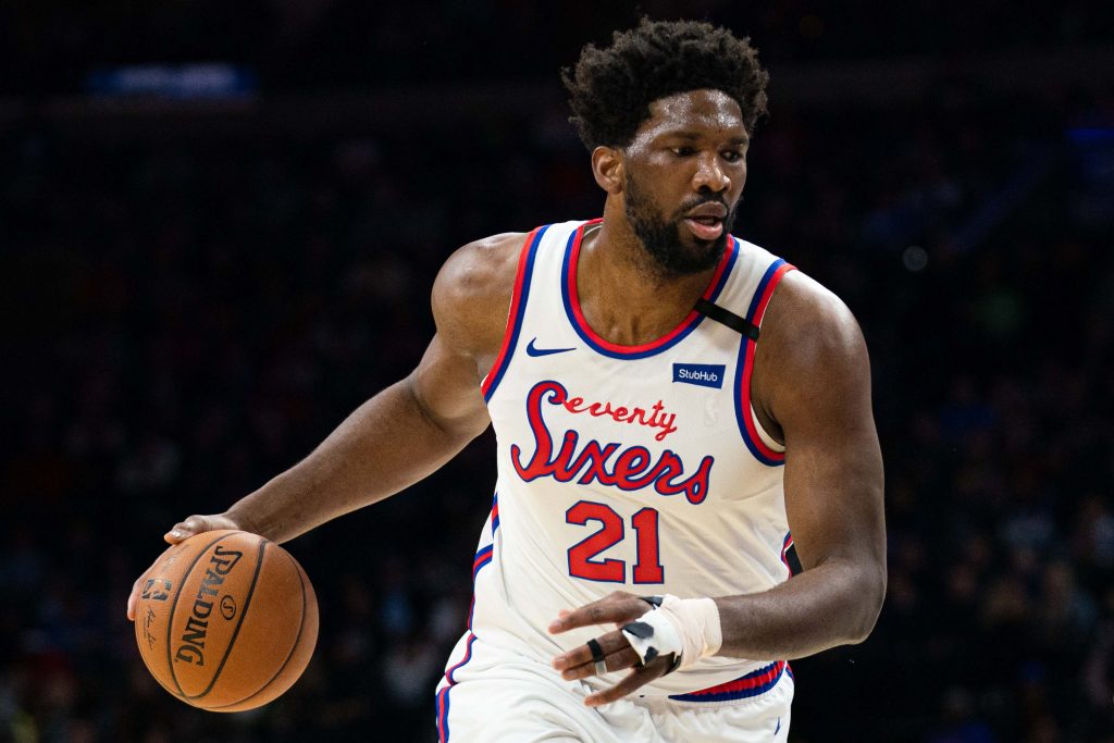 Philadelphia 76ers center Joel Embiid (21) dribbles the ball against the Memphis Grizzlies