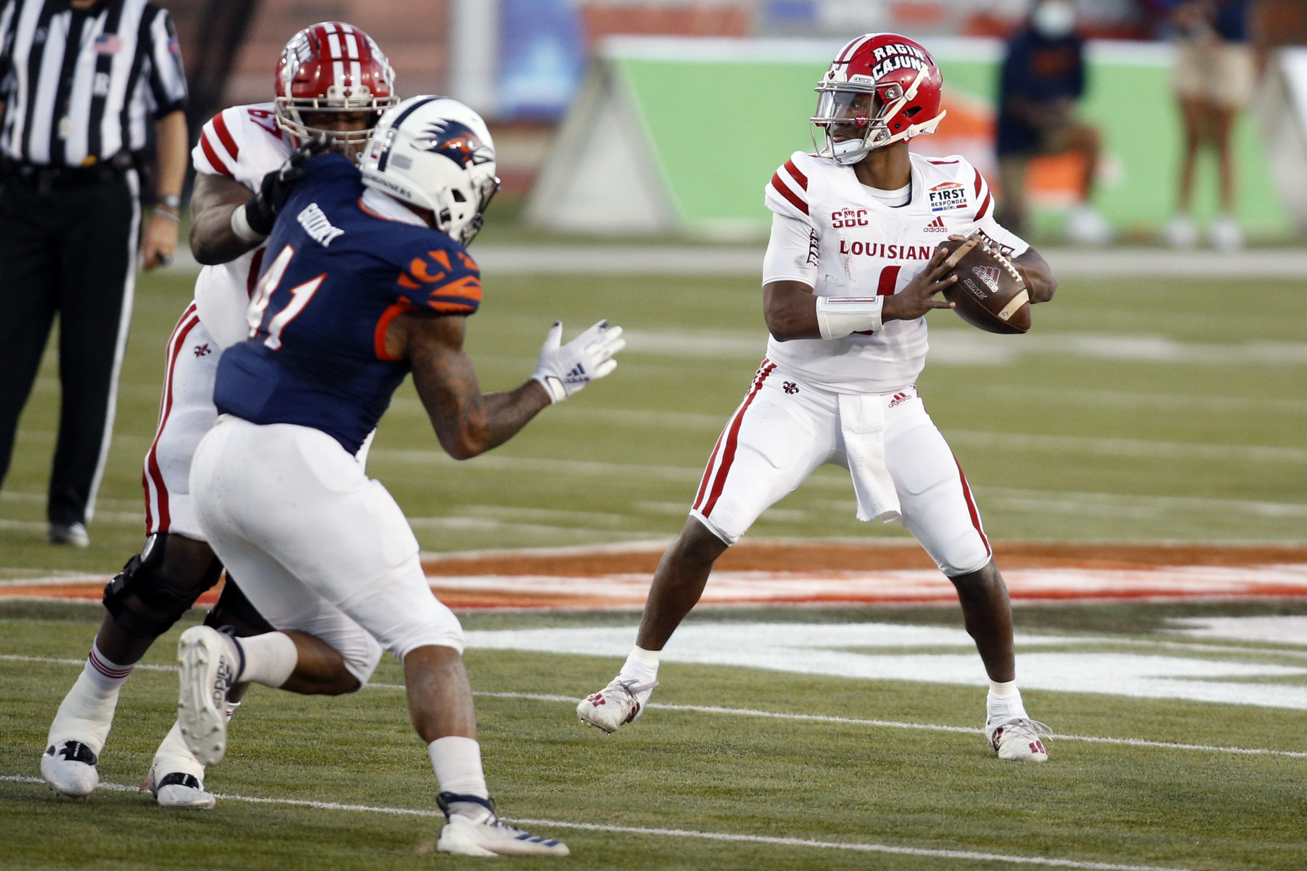 Dec 26, 2020; Dallas, TX, USA; Louisiana-Lafayette Ragin Cajuns quarterback Levi Lewis (1) throws a pass in the fourth quarter against the UTSA Roadrunners at Gerald J. Ford Stadium.