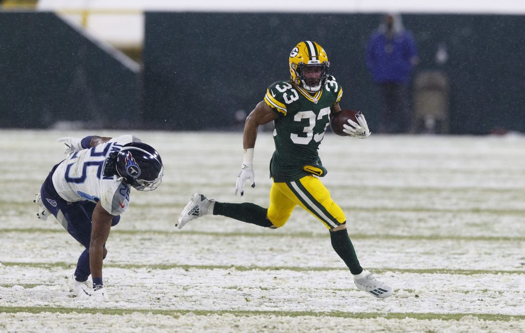 Green Bay Packers running back Aaron Jones runs with the ball during win over Tennessee Titans on Sunday Night Football