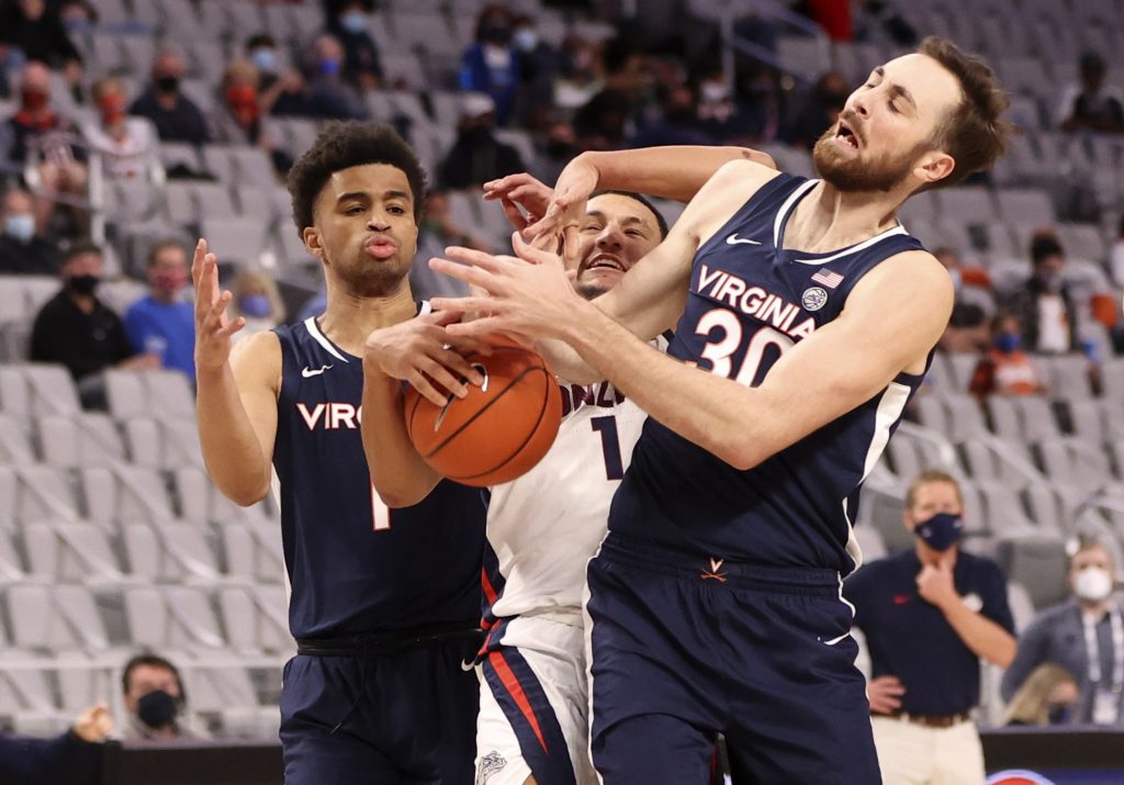 Virginia Cavaliers forward Jay Huff fights for a ball during loss to Gonzaga