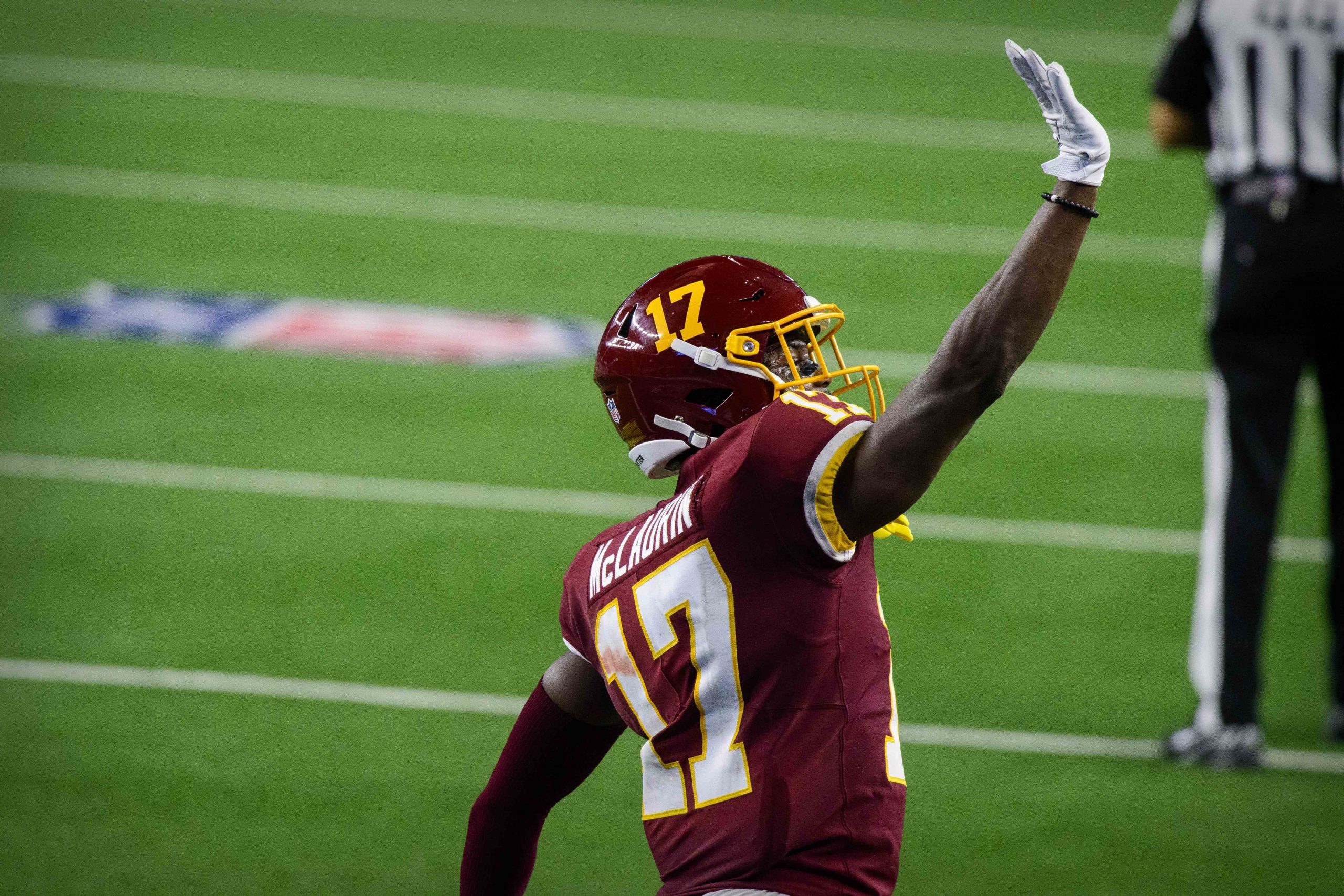 Washington Football Team wide receiver Terry McLaurin (17) waves to the Dallas Cowboys fans during the second half at AT&T Stadium.
