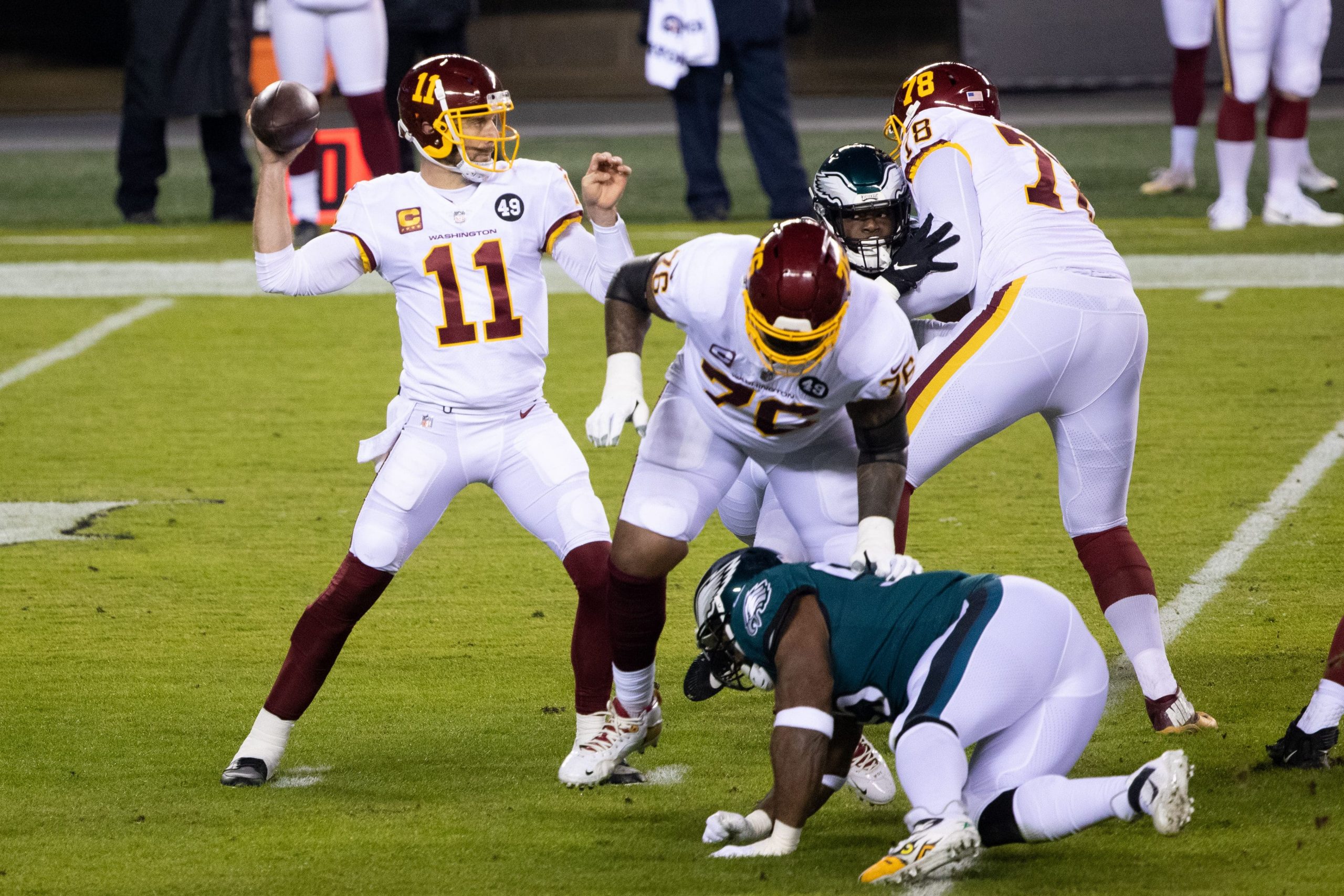 Washington Football Team quarterback Alex Smith drops back to pass during Sunday Night Football win over Philadelphia Eagles