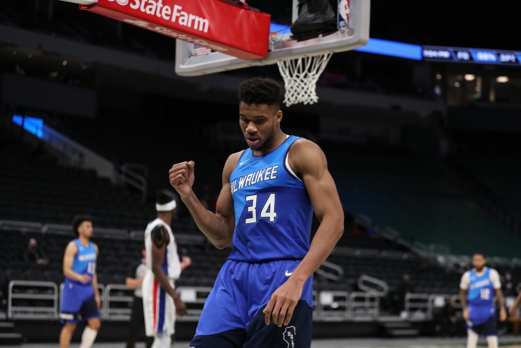 Milwaukee Bucks forward Giannis Antetokounmpo (34) reacts after scoring against the Detroit Pistons at the Bradley Center.