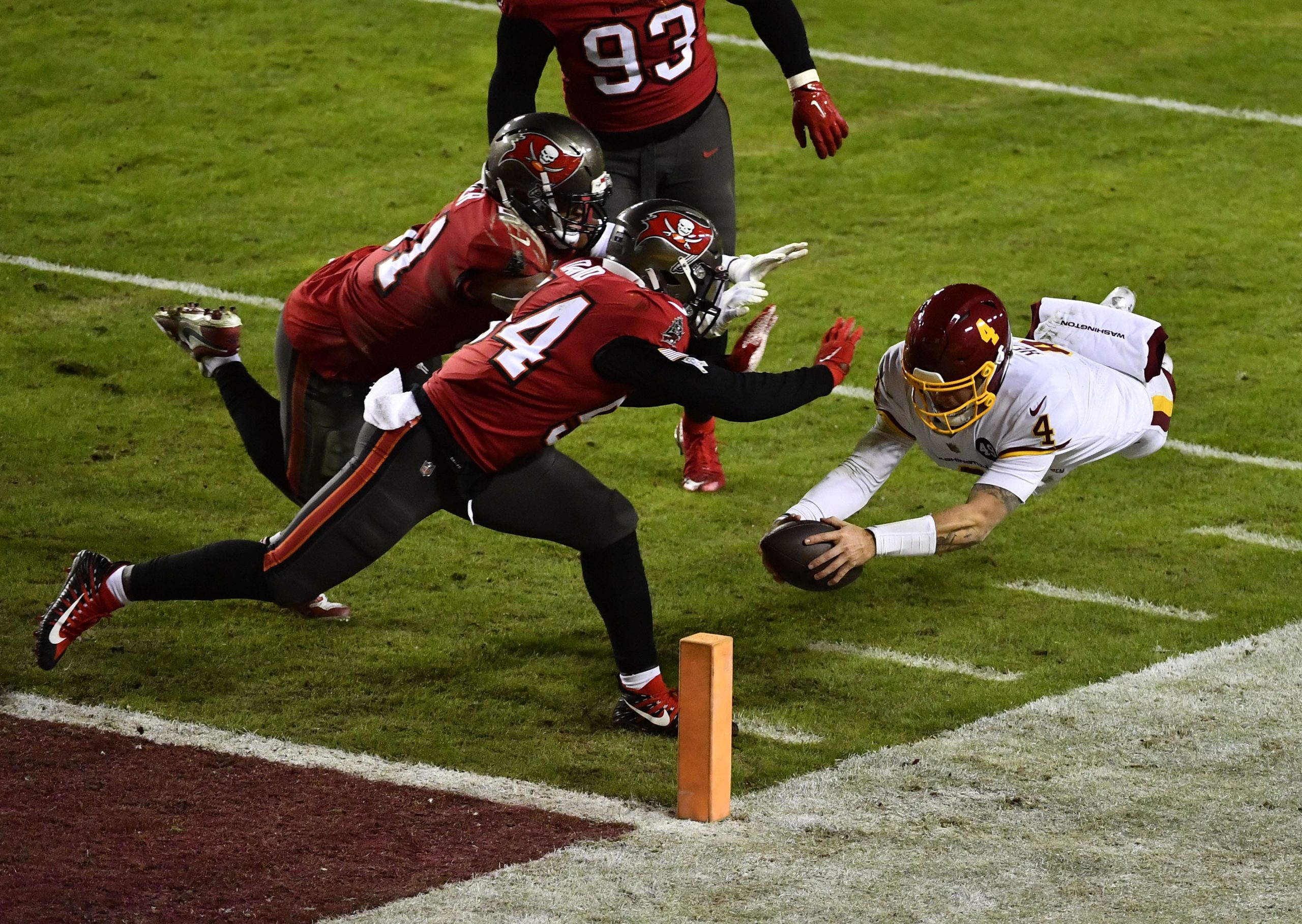 Washington Football Team quarterback Taylor Heinicke dives for the pylon during loss to Tampa Bay Buccaneers