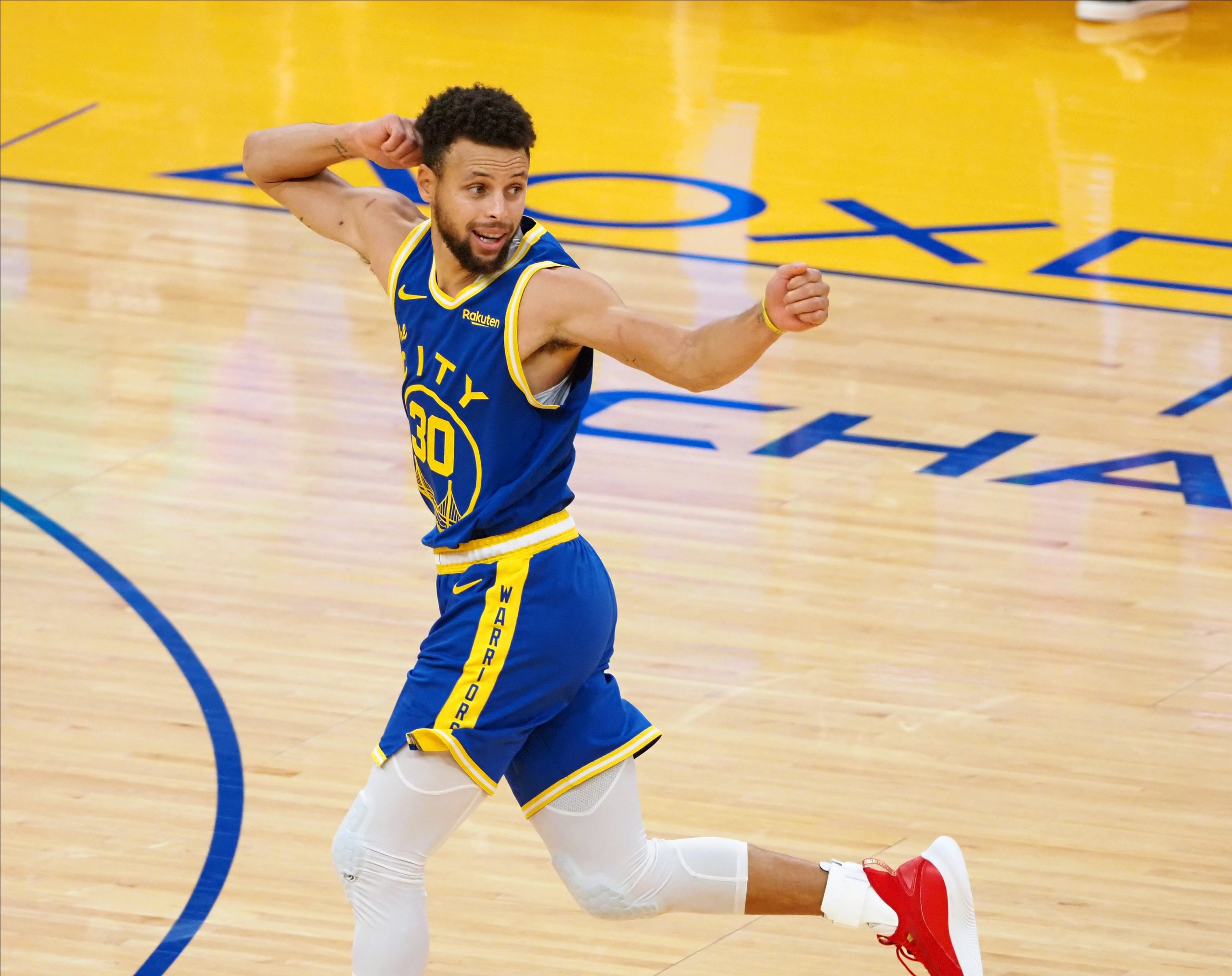 Golden State Warriors guard Stephen Curry celebrating