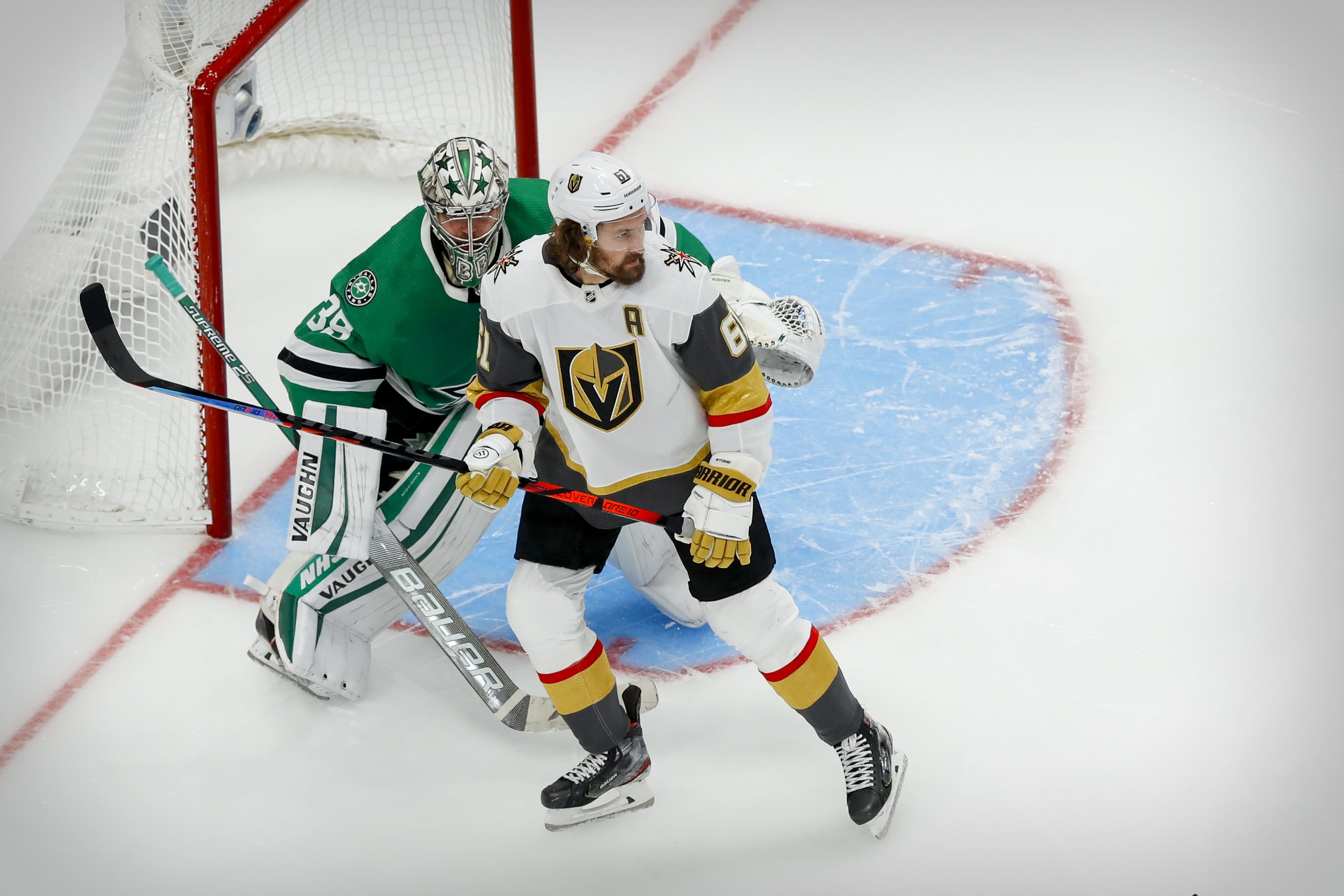 Sep 10, 2020; Edmonton, Alberta, CAN; Vegas Golden Knights right wing Mark Stone (61) screens Dallas Stars goaltender Anton Khudobin (35) during the second period in game three of the Western Conference Final of the 2020 Stanley Cup Playoffs at Rogers Place.