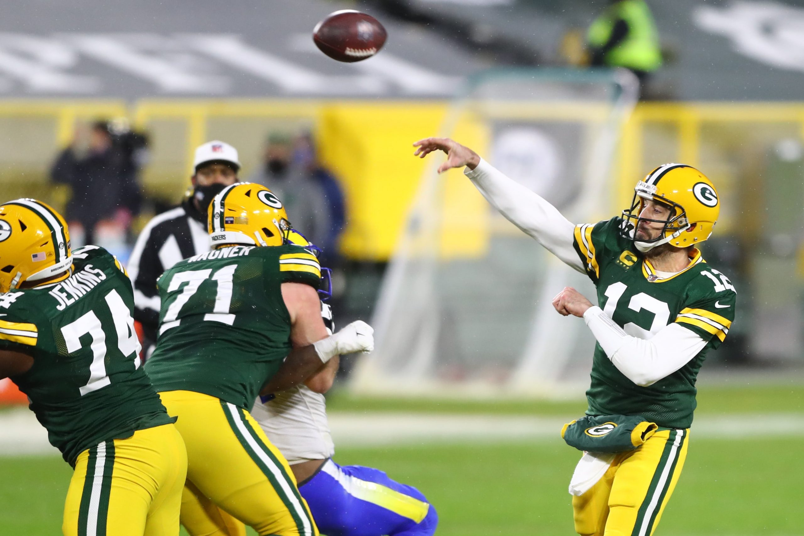 Green Bay Packers quarterback Aaron Rodgers drops back to pass during divisional round win over Los Angeles Rams