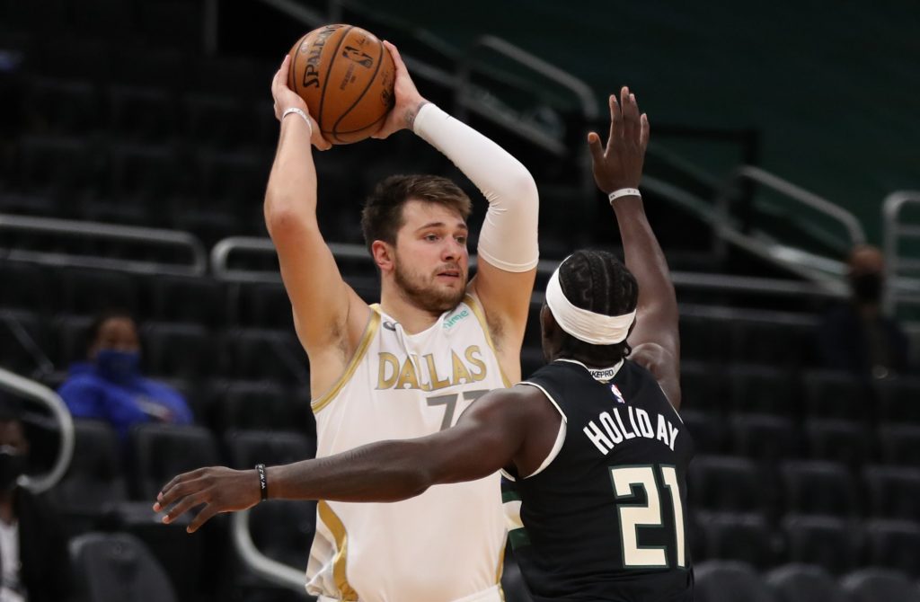 Dallas Mavericks forward Luka Doncic looking for a pass