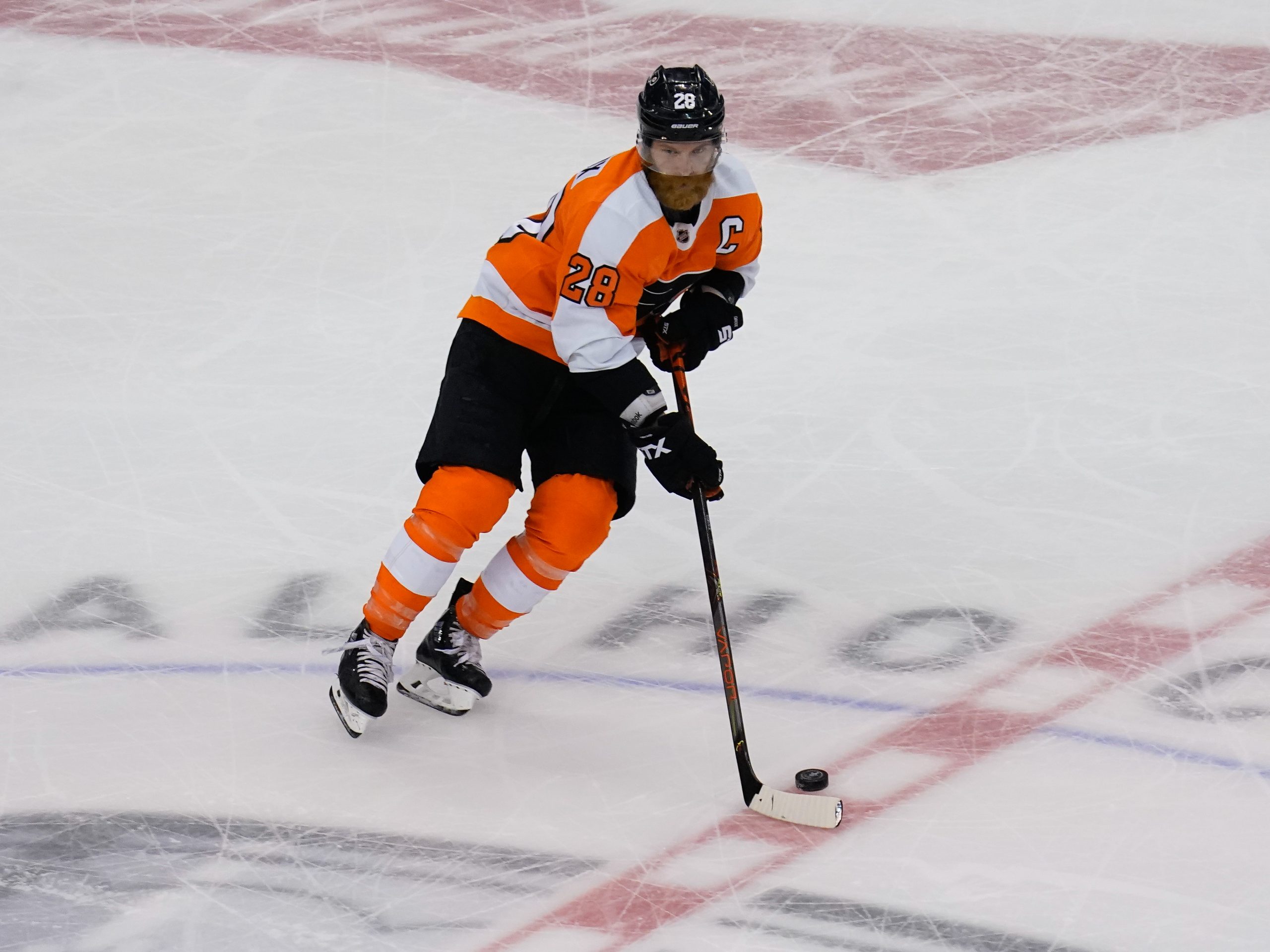 Sep 5, 2020; Toronto, Ontario, CAN; Philadelphia Flyers forward Claude Giroux (28) carries the puck against the New York Islanders during game seven of the second round of the 2020 Stanley Cup Playoffs at Scotiabank Arena. New York defeated Philadelphia.