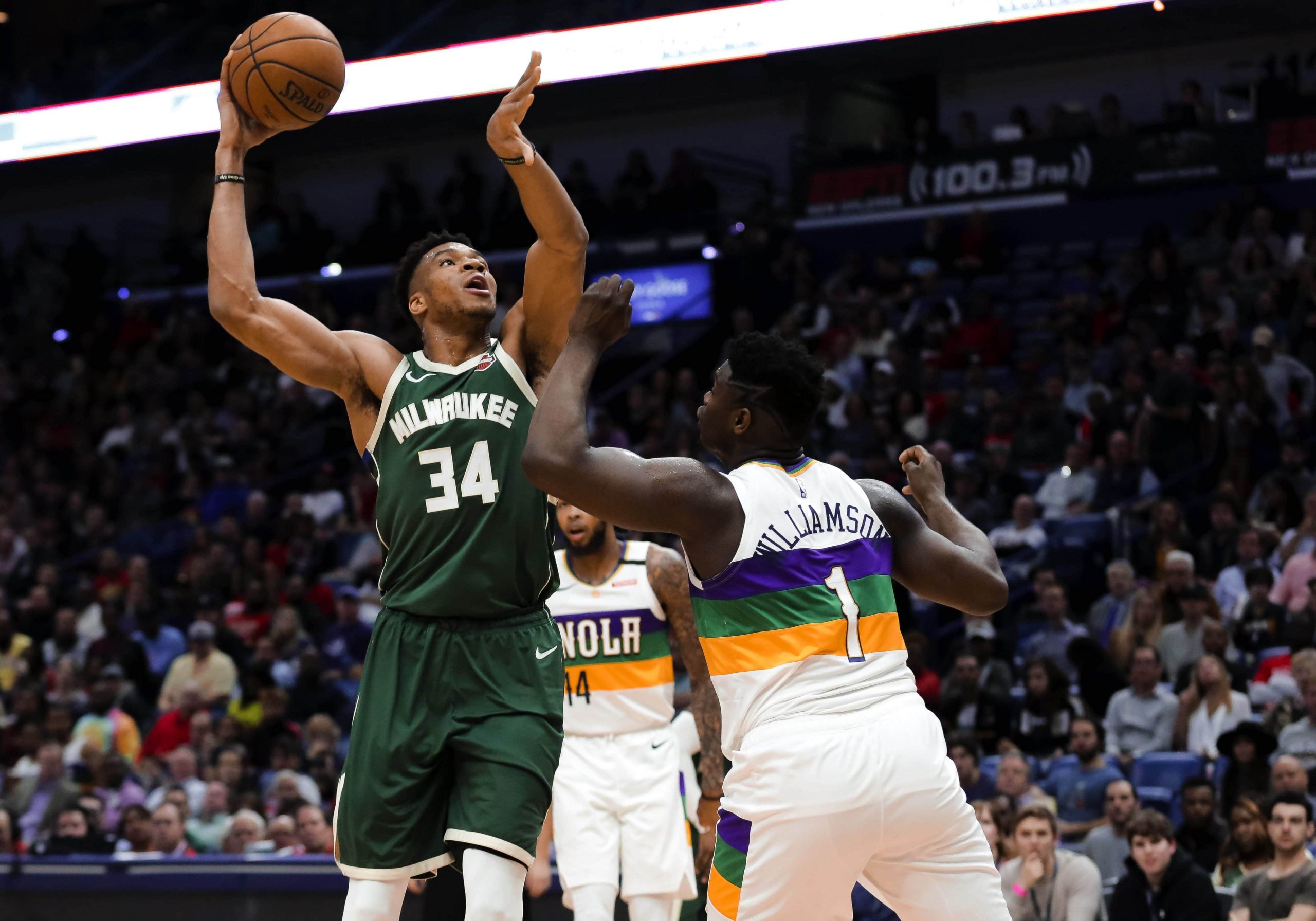 Milwaukee Bucks forward Giannis Antetokounmpo shoots over New Orleans Pelicans forward Zion Williamson