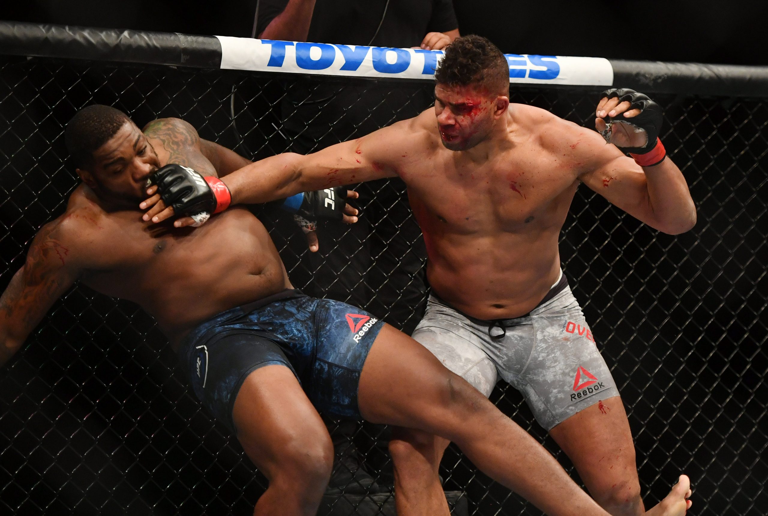 May 16, 2020; Jacksonville, Florida, USA; Alistair Overeem (red gloves) fights Walt Harris (blue gloves) during UFC on ESPN at VyStar Veterans Memorial Arena.
