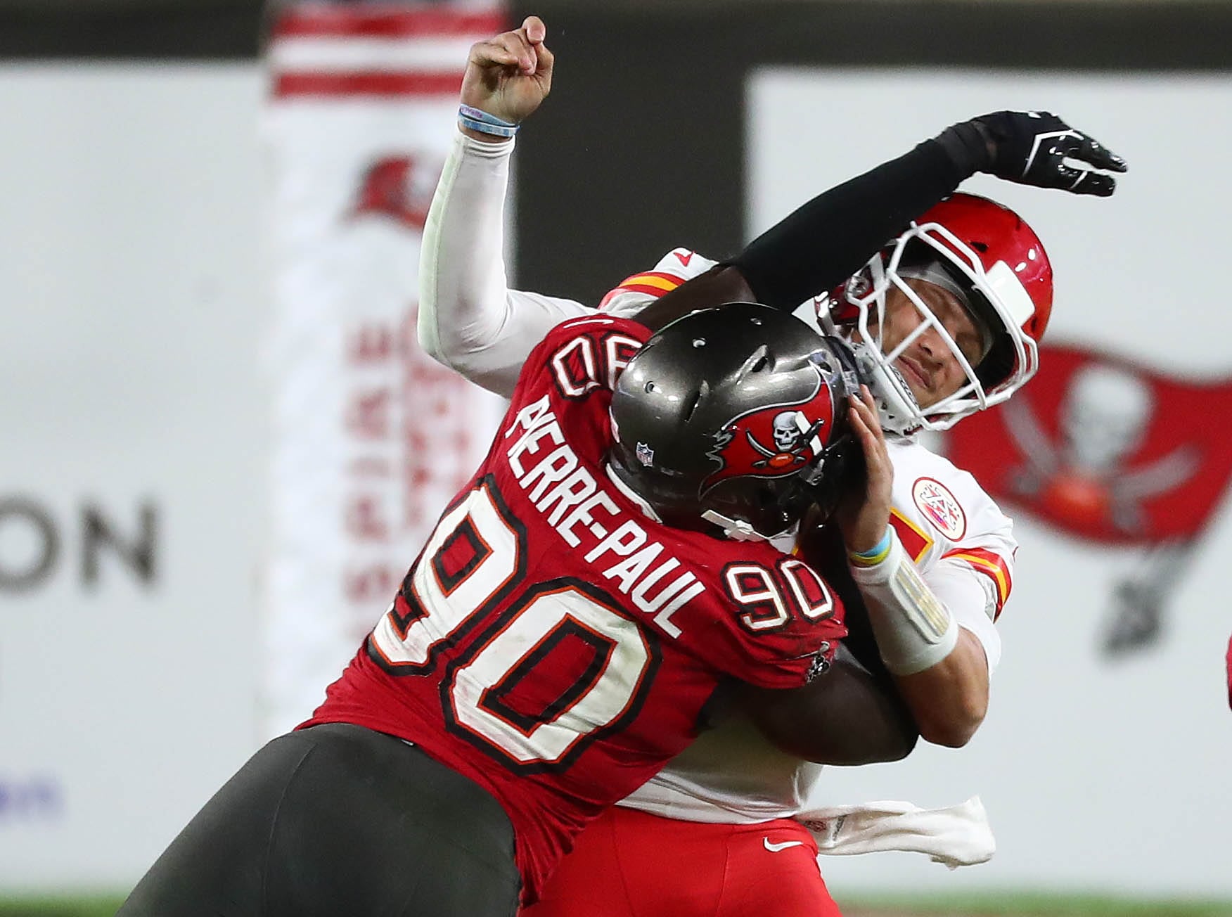 Tampa Bay Buccaneers defensive end Jason Pierre-Paul hits Kansas City Chiefs quarterback Patrick Mahomes during game at Raymond James Stadium