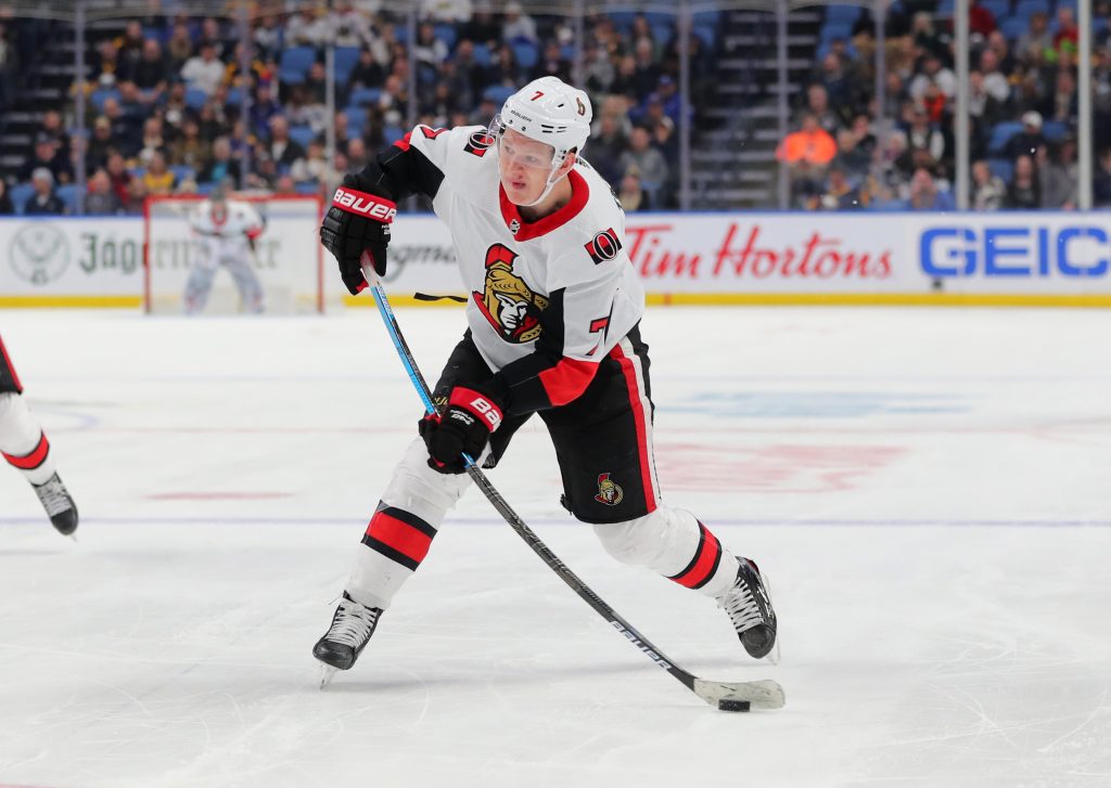 Jan 28, 2020; Buffalo, New York, USA; Ottawa Senators left wing Brady Tkachuk (7) takes a shot on goal during the third period against the Buffalo Sabres at KeyBank Center.