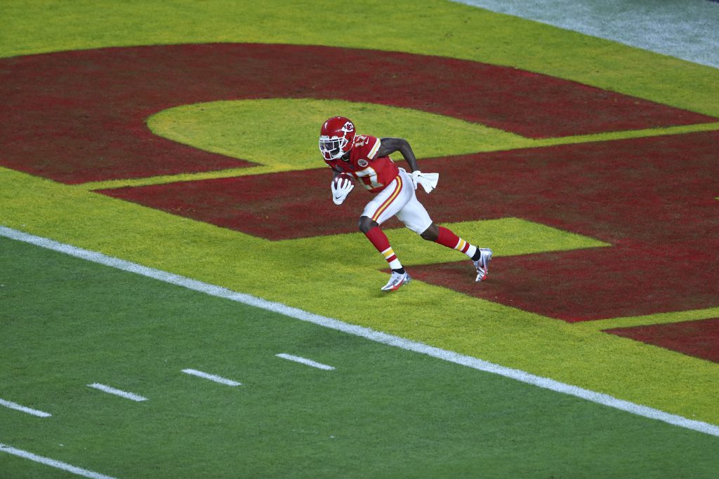 Kansas City Chiefs wide receiver Mecole Hardman (17) runs the opening kickoff from the end zone in Super Bowl LIV at Hard Rock Stadium.