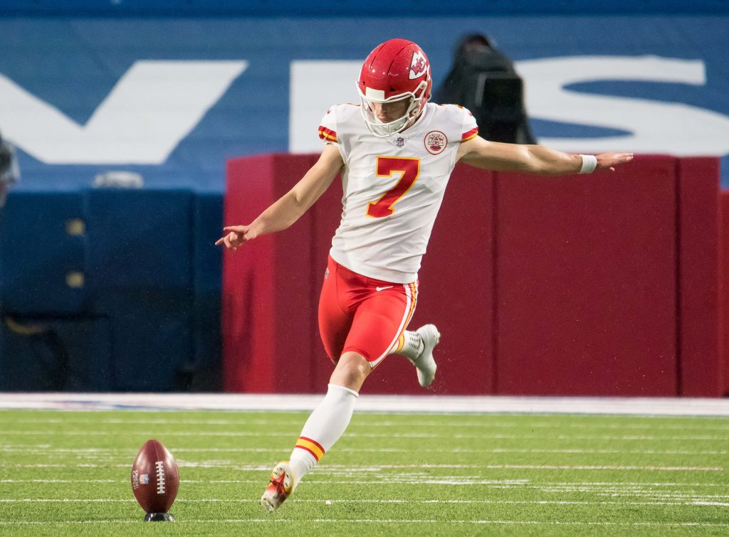 Kansas City Chiefs kicker Harrison Butker (7) sets for a kickoff against the Buffalo Bills in the second quarter at Bills Stadium.