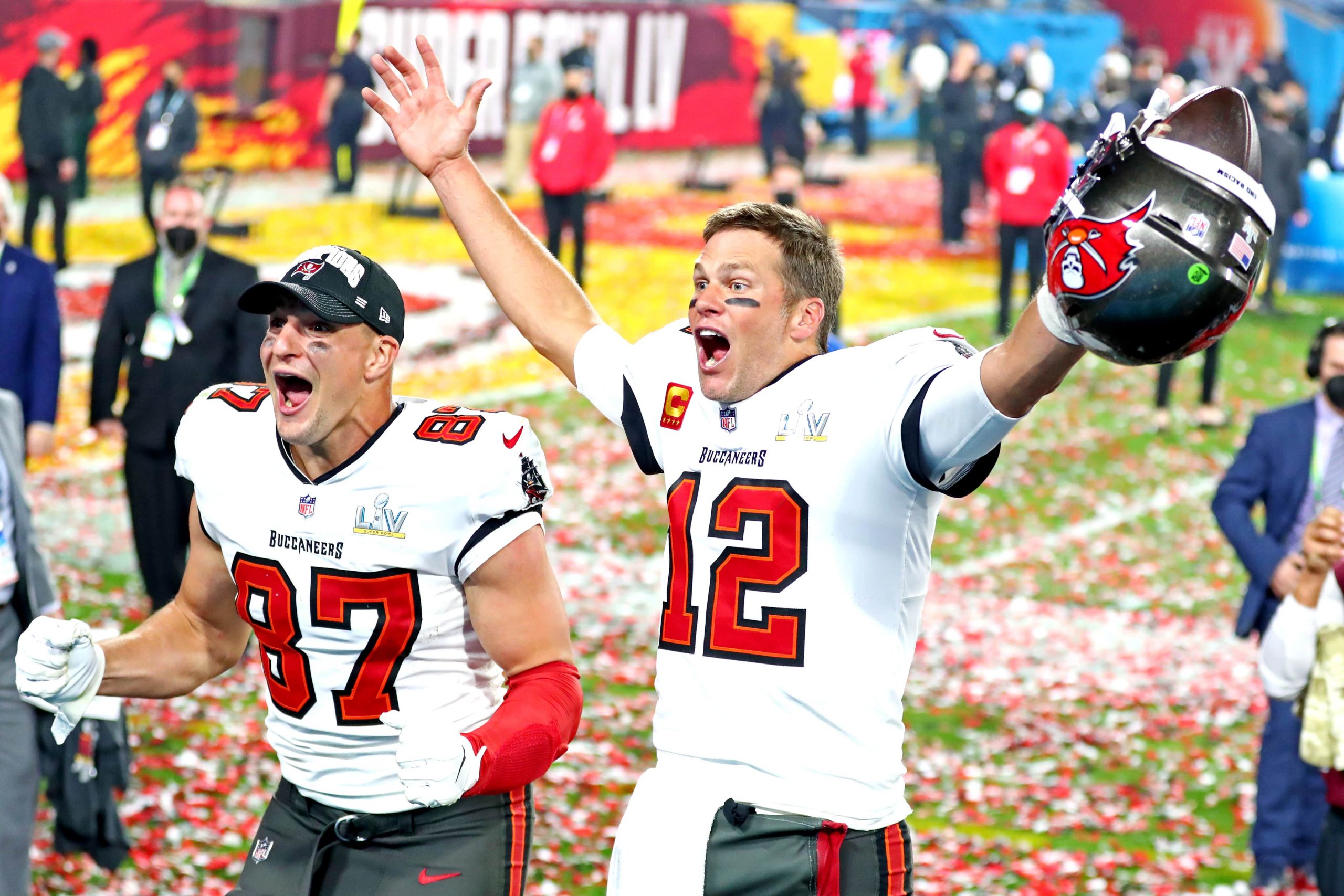 Tampa Bay Buccaneers quarterback Tom Brady (12) and tight end Rob Gronkowski (87) celebrate after beating the Kansas City Chiefs in Super Bowl LV at Raymond James Stadium.