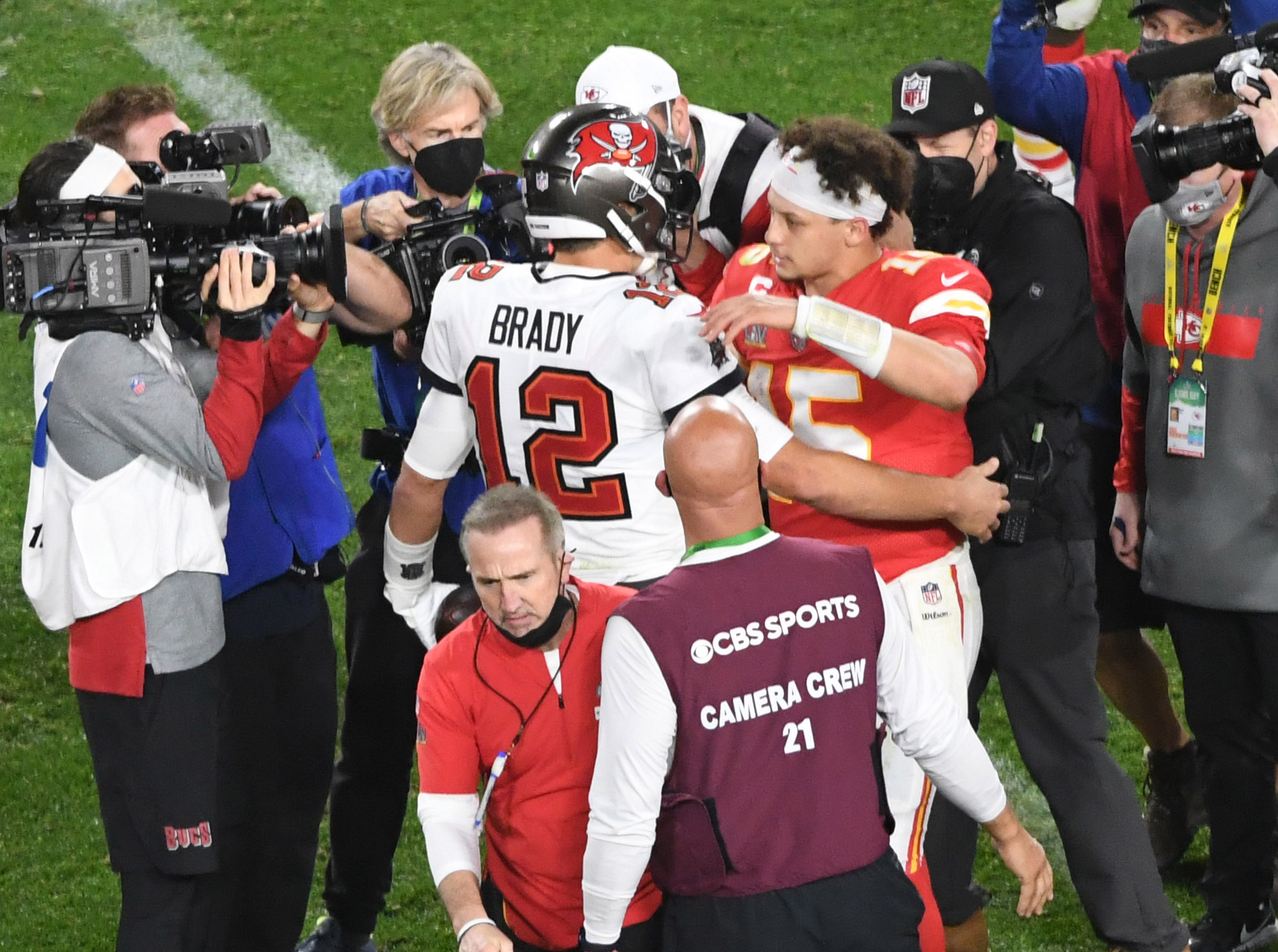 Tampa Bay Buccaneers quarterback Tom Brady, Kansas City Chiefs quarterback Patrick Mahomes meet at halftime after Super Bowl LV