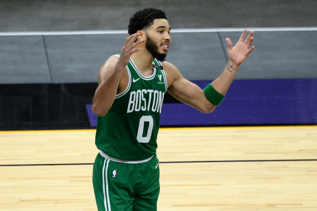 Boston Celtics forward Jayson Tatum (0) looks on against the Phoenix Suns during the second half at Phoenix Suns Arena