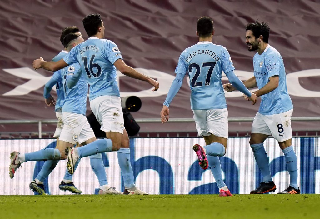 2/7/2021 - Manchester City's Ilkay Gundogan (right) celebrates scoring their side's second goal of the game during the Premier League match at Anfield, Liverpool. Picture date: Sunday February 7, 2021.