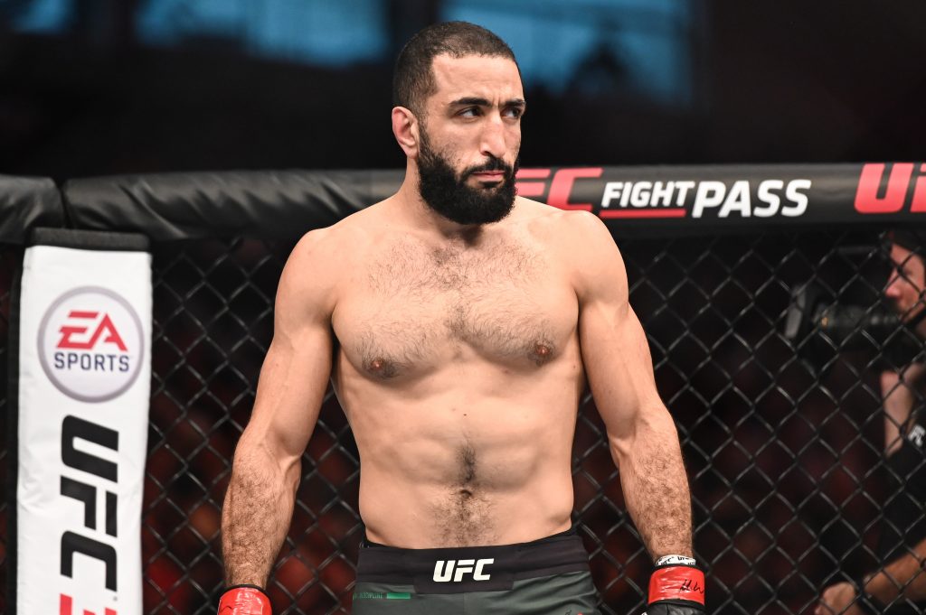 Sep 7, 2019; Abu Dhabi, UAE; Belal Muhammad (red gloves) fights Takashi Sato (not pictured) during UFC 242 at The Arena.