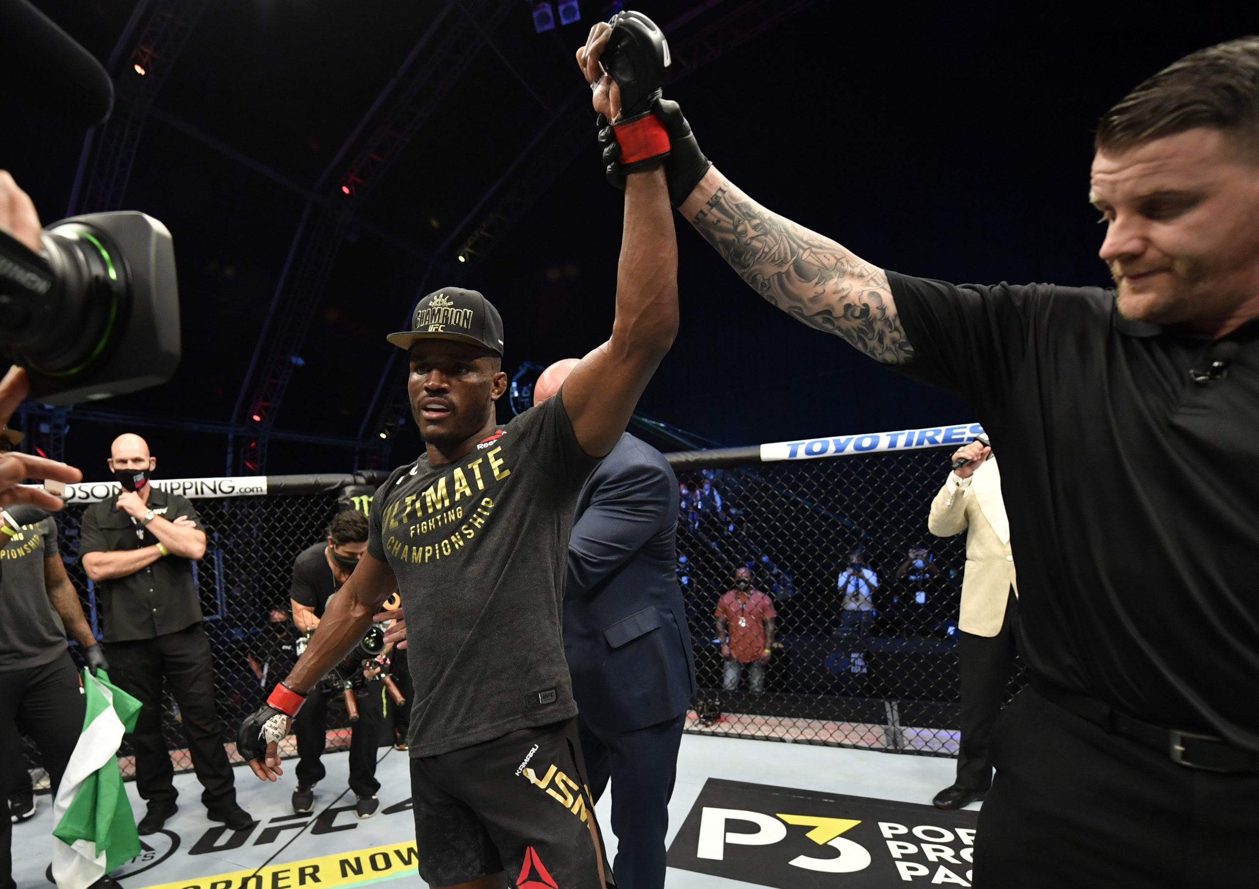 July 12, 2020; Abu Dhabi, UAE; Kamaru Usman of Nigeria celebrates after his victory over Jorge Masvidal in their UFC welterweight championship fight during the UFC 251 event at Flash Forum on UFC Fight Island on July 12, 2020 on Yas Island, Abu Dhabi, United Arab Emirates.