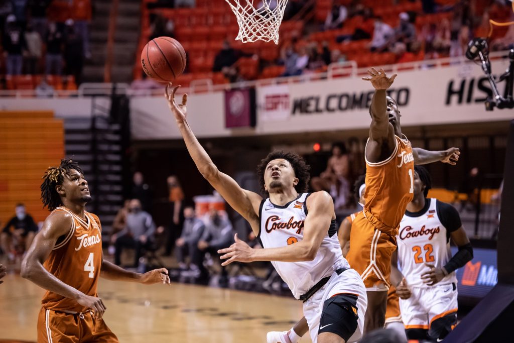 Cade Cunningham drives to the rim for the Oklahoma State Cowboys