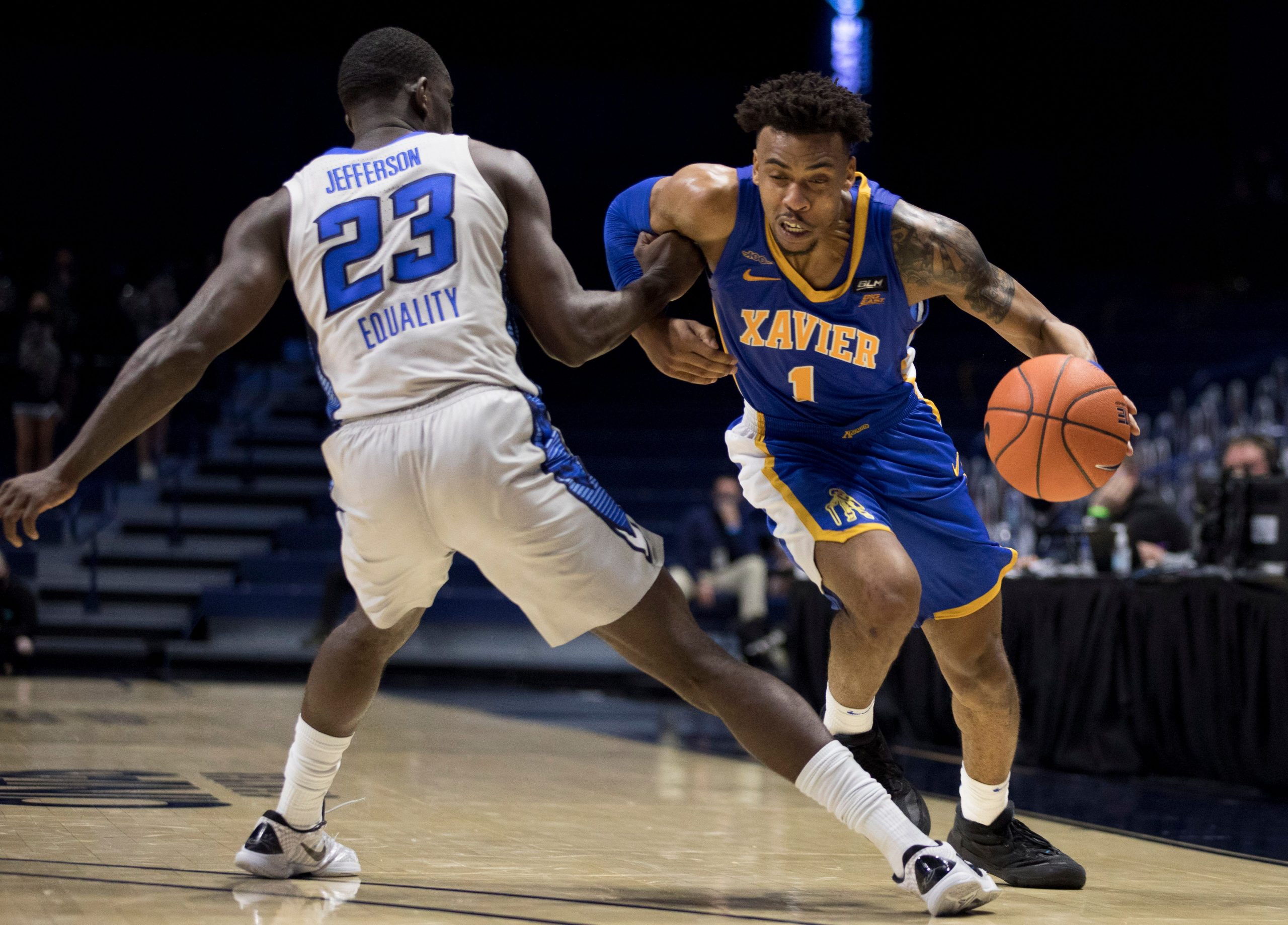 Paul Scruggs drives to rim for Xavier Musketeers