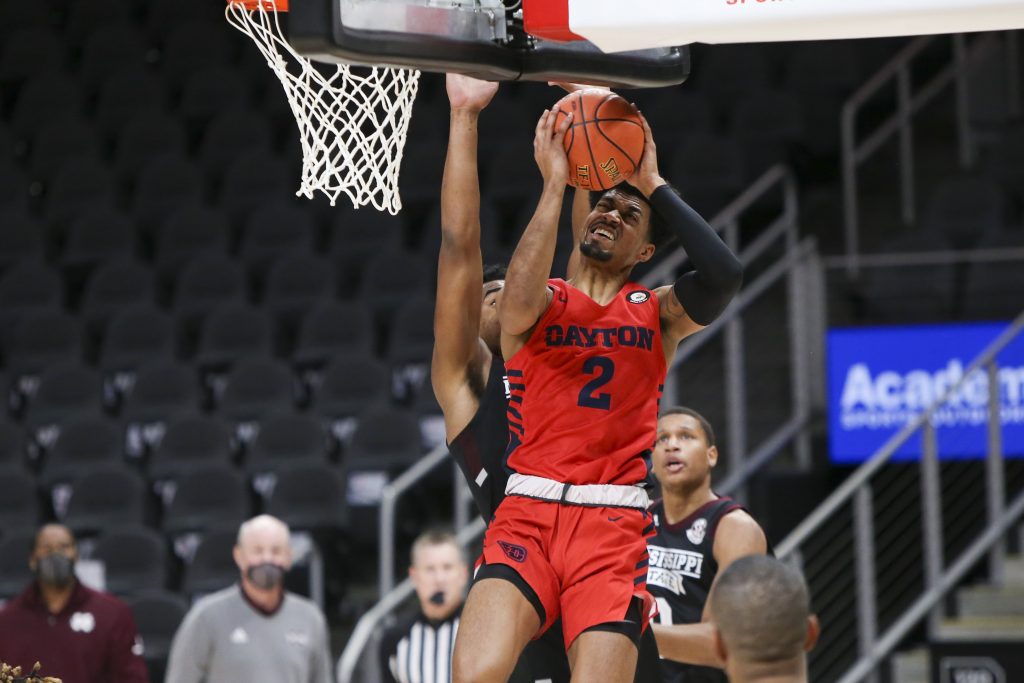 Ibi Watson shoots jumper for Dayton Flyers