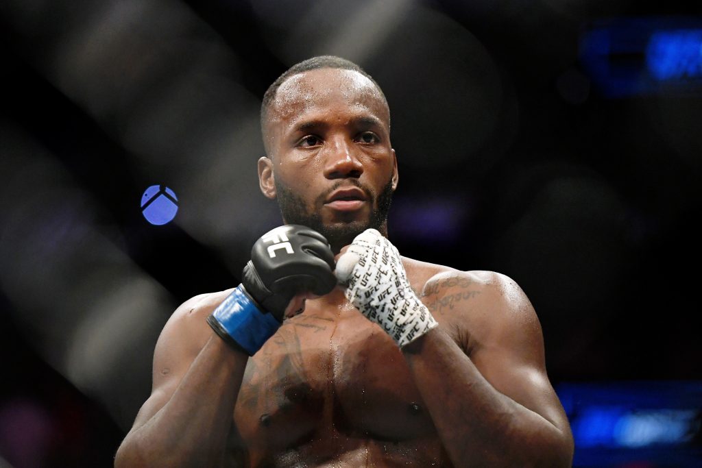 Jul 20, 2019; San Antonio, TX, USA; Leon Edwards (blue gloves) after his win over Rafael Dos Anjos (not pictured) during UFC Fight Night at AT&T Center. Edwards won by unanimous decision.