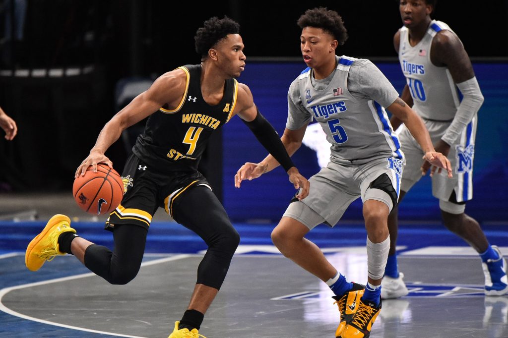 Wichita State Shockers guard Ricky Council IV handles the ball against Memphis Tigers guard Boogie Ellis