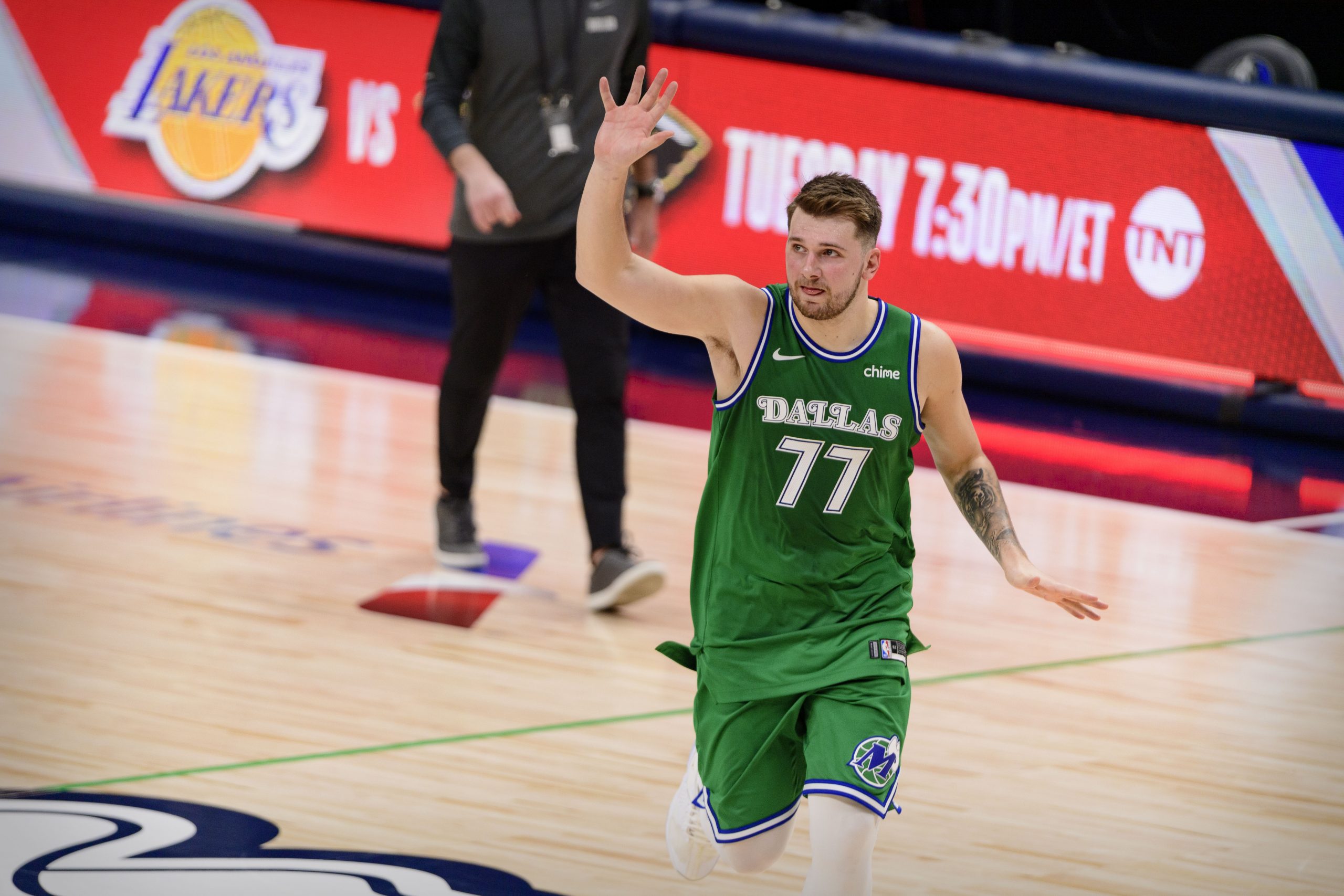 Luka Doncic waving to the crowd