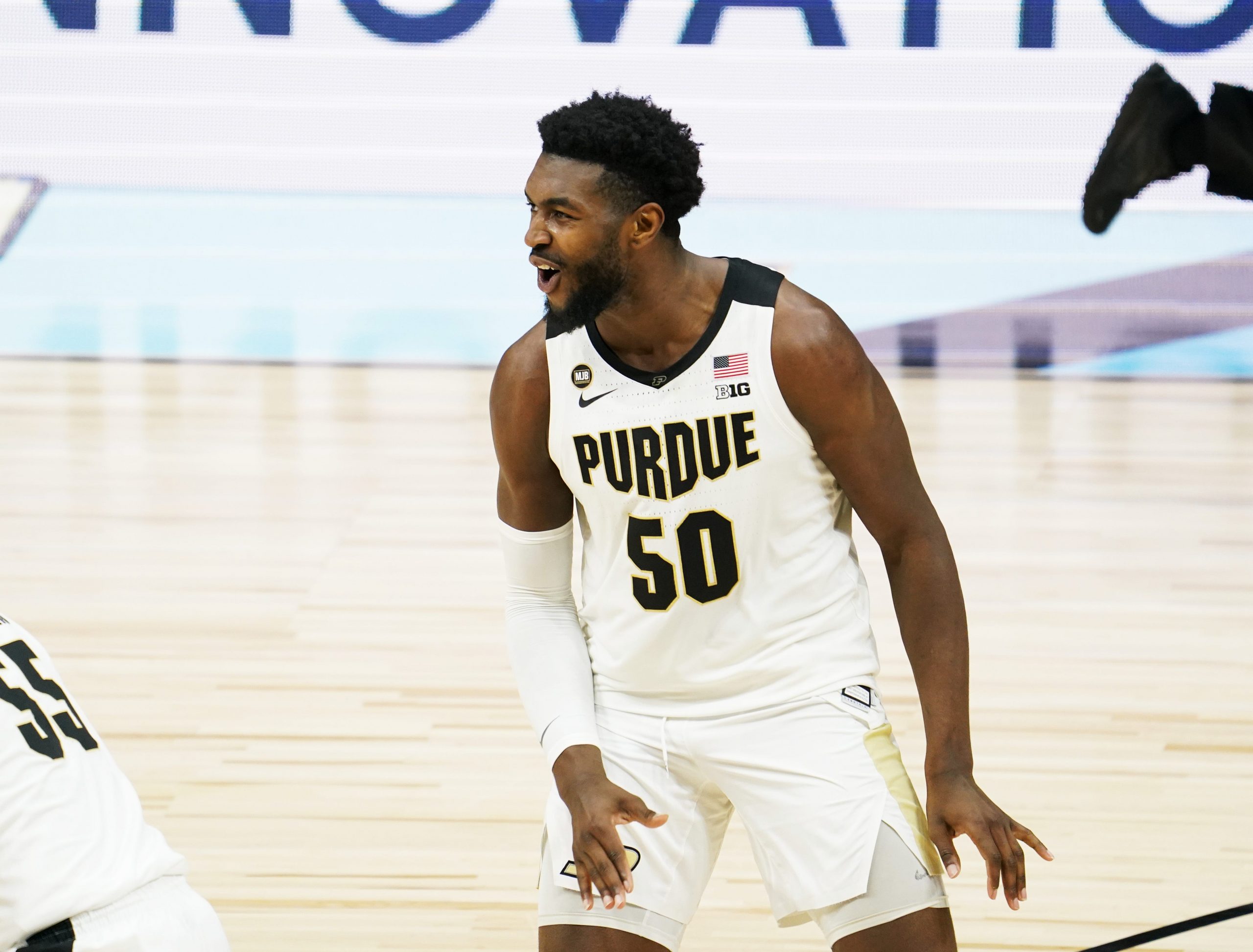 Purdue Boilermakers forward Trevion Williams (50) yells in excitement during the Big Ten tournament, Friday, March 12, 2021 at Lucas Oil Stadium
