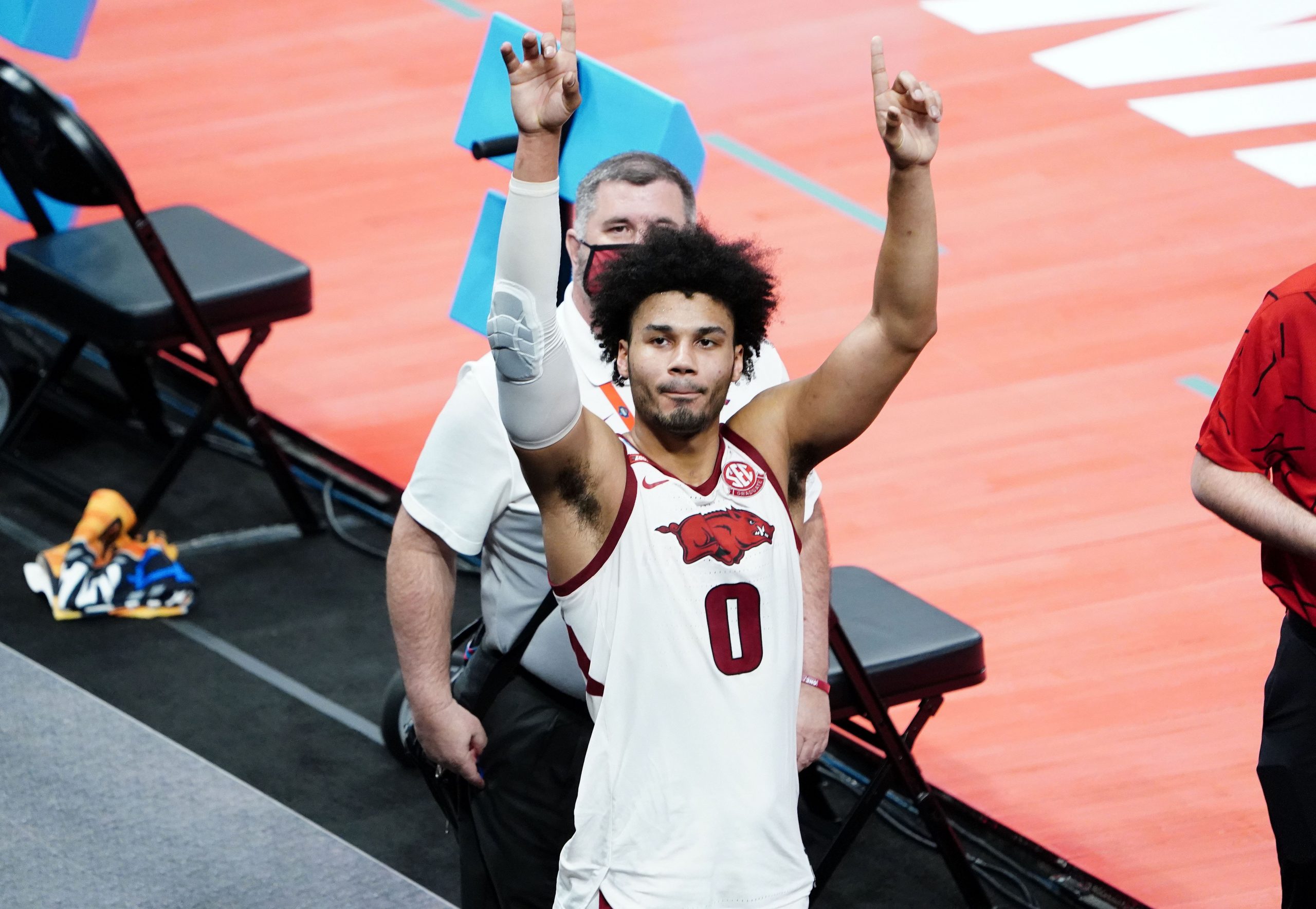 Arkansas Razorbacks forward Justin Smith (0) gestures after the game against the Colgate Raiders during the first round of the 2021 NCAA Tournament at Bankers Life Fieldhouse