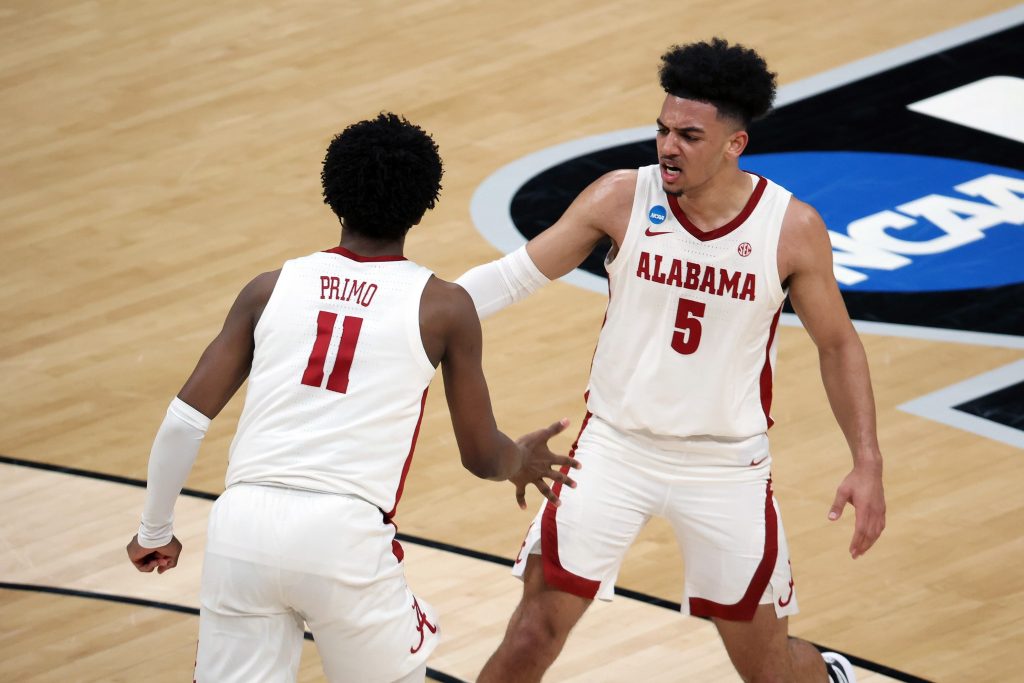 Alabama Crimson Tide guard Jaden Shackelford (5) and guard Joshua Primo (11) react after a play against the Maryland Terrapins in the second half in the second round of the 2021 NCAA Tournament.