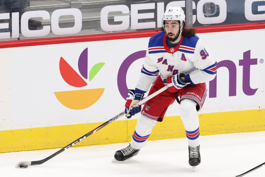 Mar 19, 2021; Washington, District of Columbia, USA; New York Rangers center Mika Zibanejad (93) skates with the puck against the Washington Capitals at Capital One Arena.