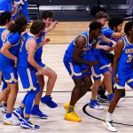 UCLA Bruins celebrates after their win over Alabama Crimson Tide during the Sweet Sixteen round of the 2021 NCAA Tournament on Sunday, March 28, 2021, at Hinkle Fieldhouse in Indianapolis, Ind.