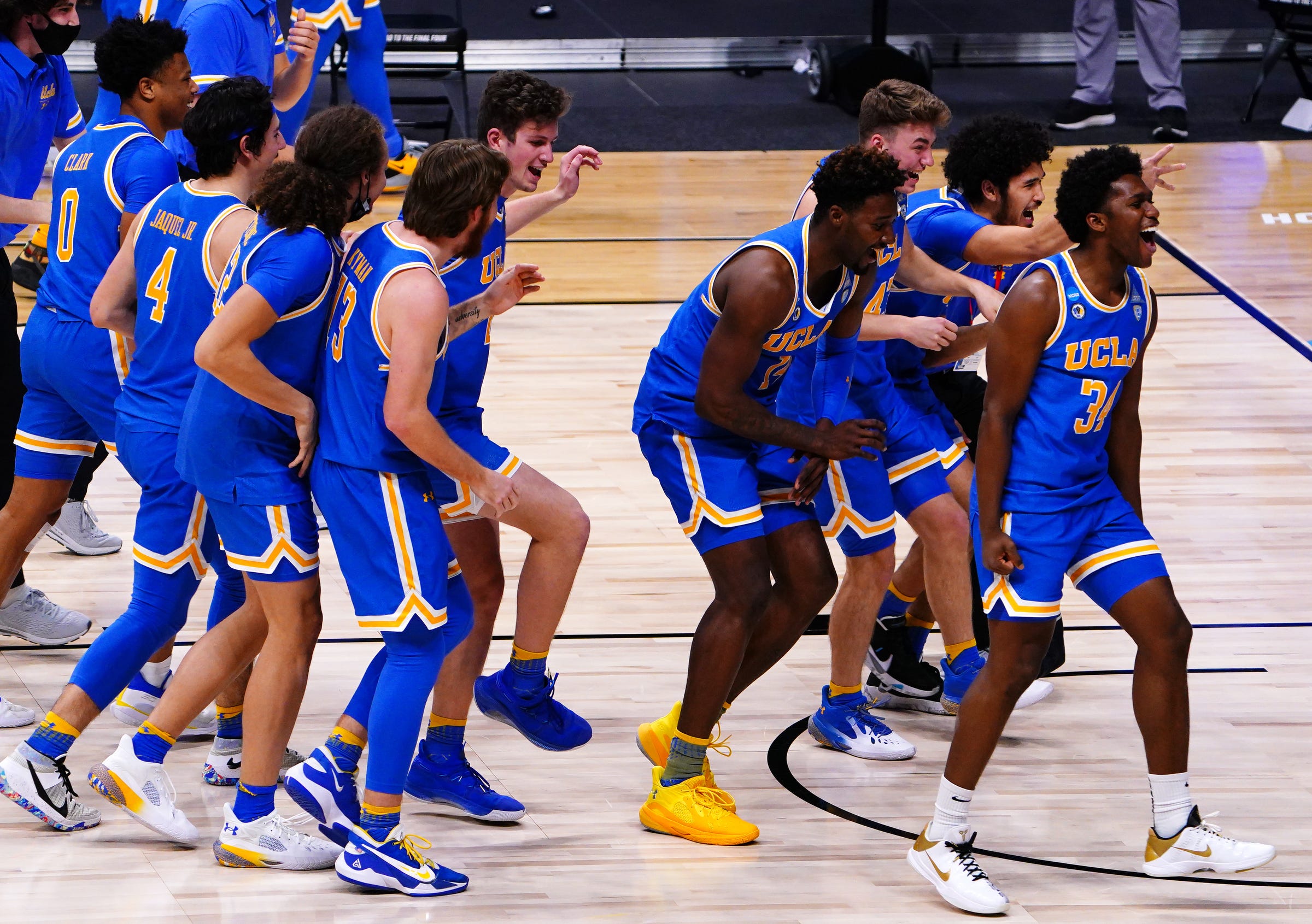 UCLA Bruins celebrates after their win over Alabama Crimson Tide during the Sweet Sixteen round of the 2021 NCAA Tournament on Sunday, March 28, 2021, at Hinkle Fieldhouse in Indianapolis, Ind.