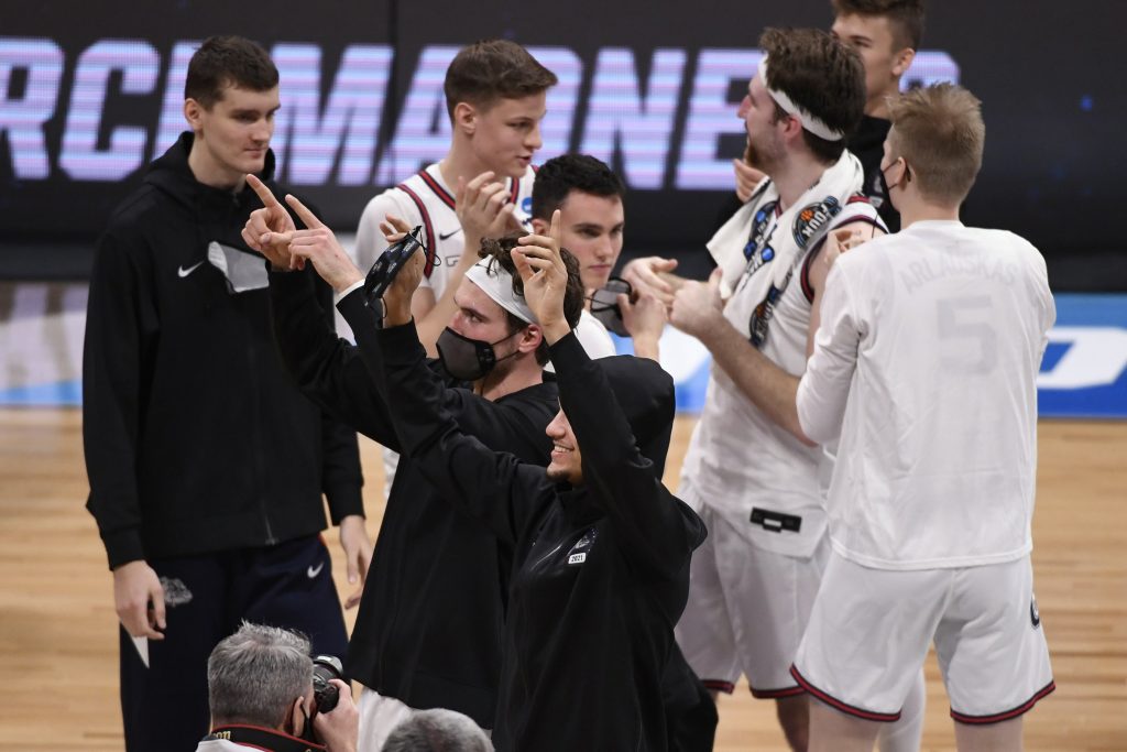 The Gonzaga Bulldogs celebrate after defeating the Creighton Bluejays during the Sweet 16 of the 2021 NCAA Tournament at Hinkle Fieldhouse