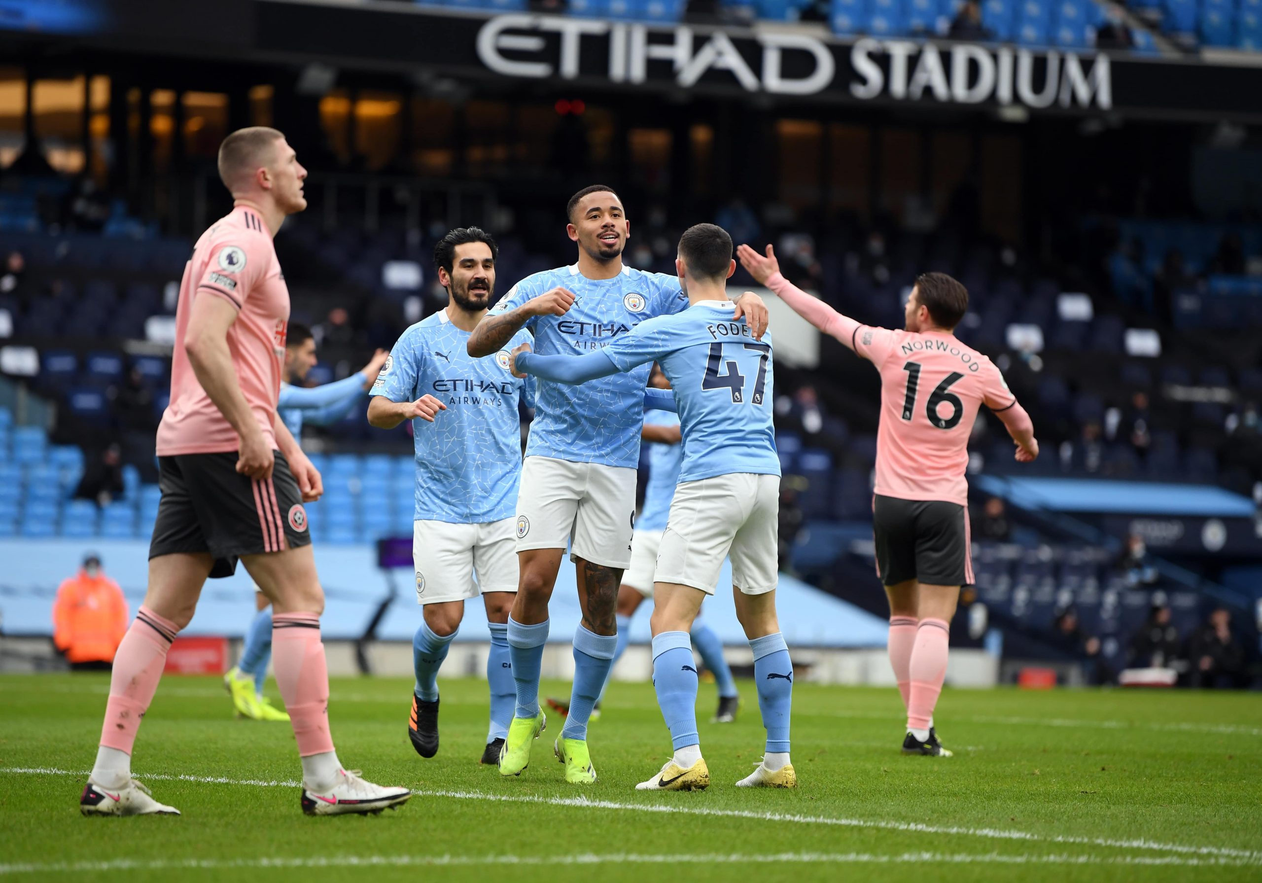 Manchester City's Gabriel Jesus celebrates scoring the opening goal of the game with Phil Foden during the Premier League match at Etihad Stadium, Manchester.