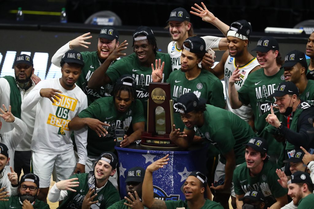 Baylor Bears pose for a team photo after defeating the Arkansas Razorbacks to advance to the final four in the Elite Eight of the 2021 NCAA Tournament at Lucas Oil Stadium.