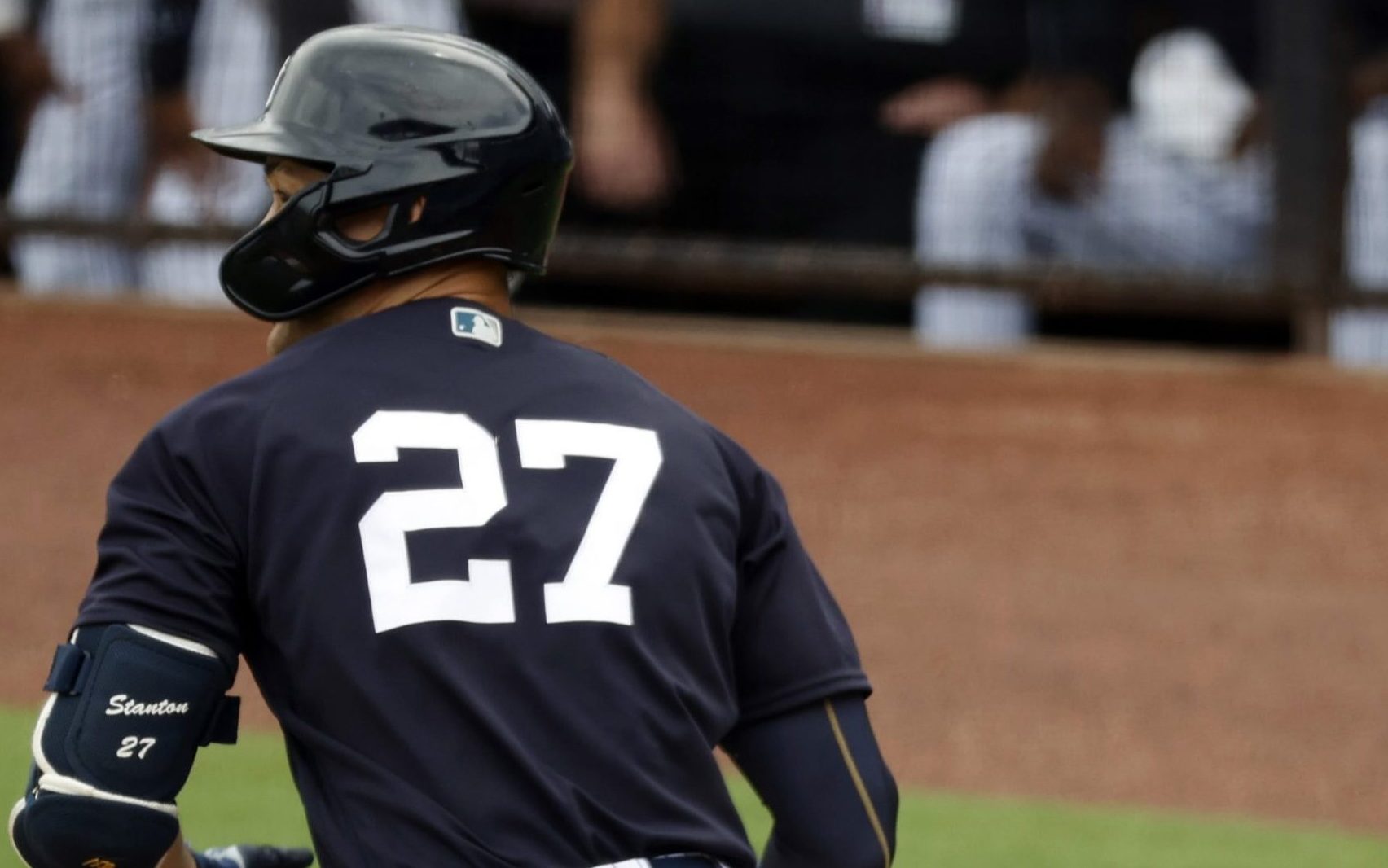 Giancarlo Stanton swings during Spring Training