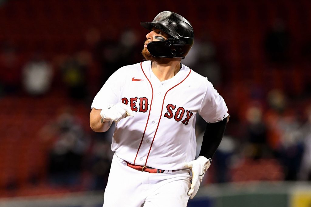 Boston Red Sox catcher Christian Vazquez (7) looks into the outfield after hitting a solo home run against the Tampa Bay Rays during the ninth inning at Fenway Park