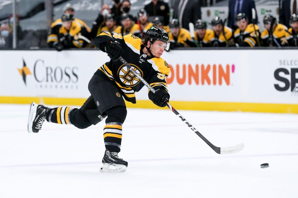 Boston Bruins defenseman Jack Ahcan takes a shot