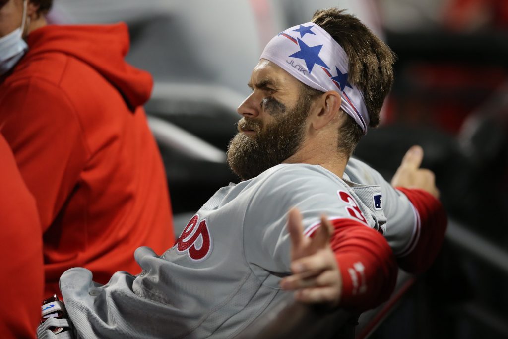 Philadelphia Phillies right fielder Bryce Harper (3) reacts in the dugout during the seventh inning against the New York Mets at Citi Field.