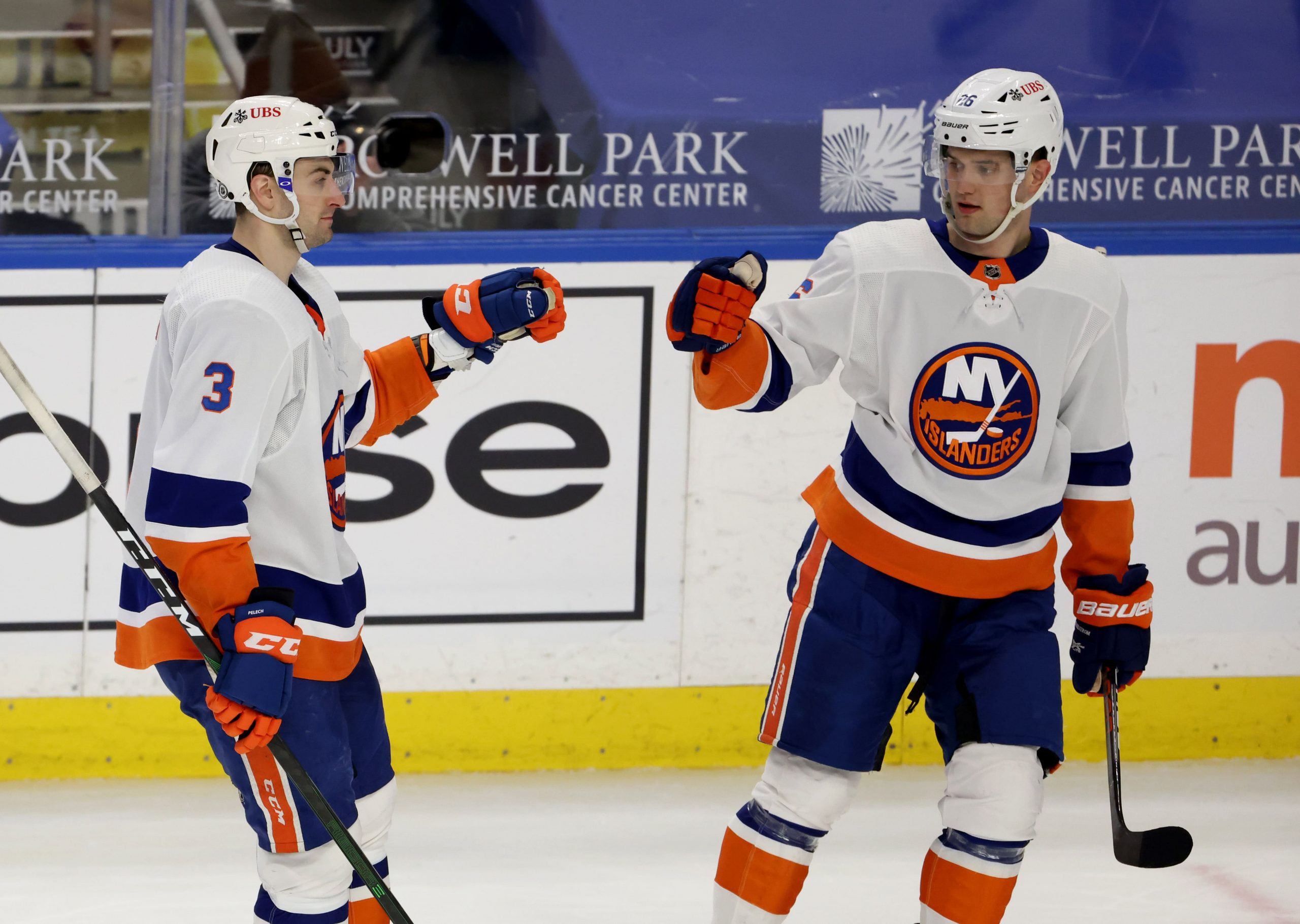 New York Islanders right wing Oliver Wahlstrom celebrates his goal with defenseman Adam Pelech